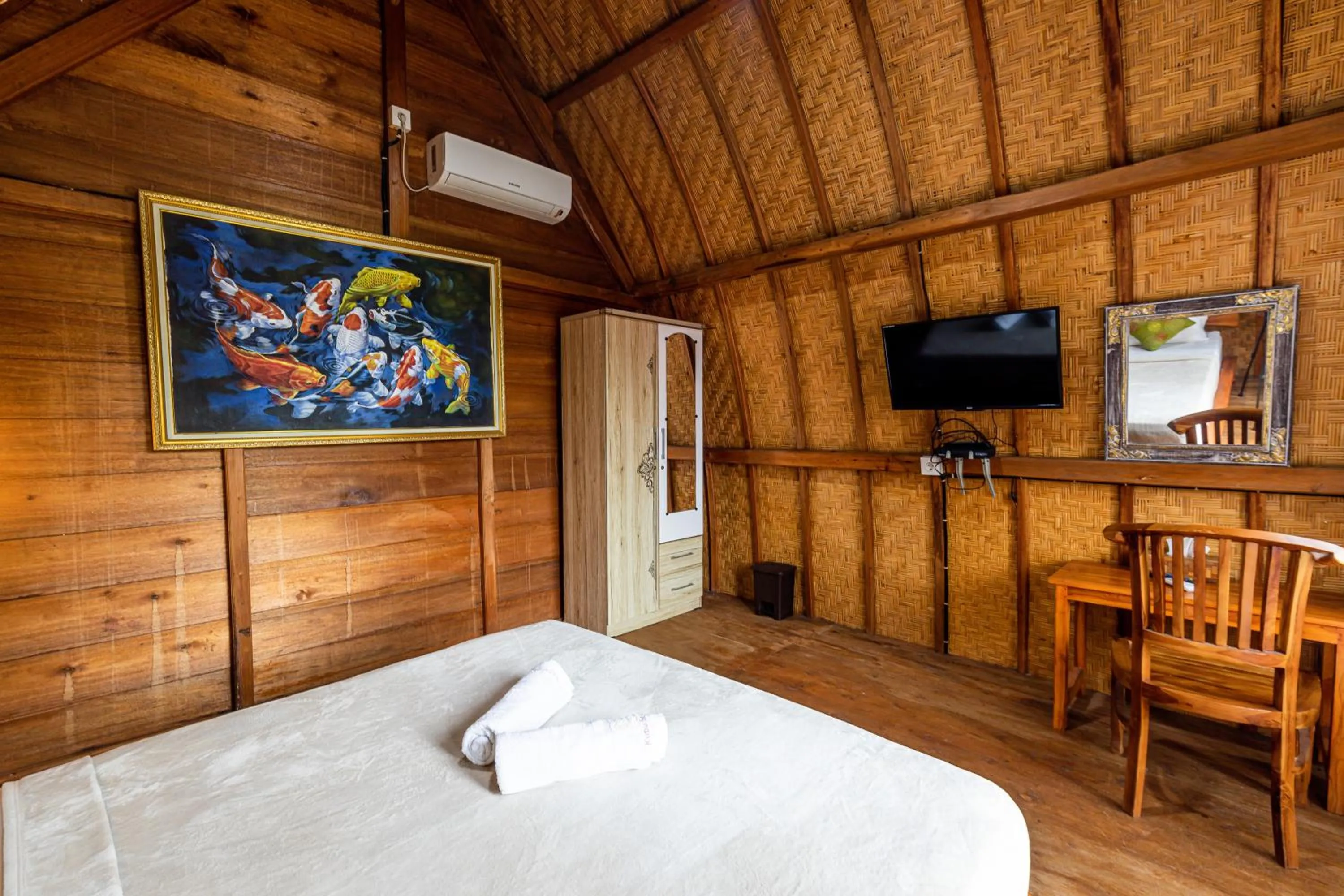 Bed in Kubu Sental Cottage