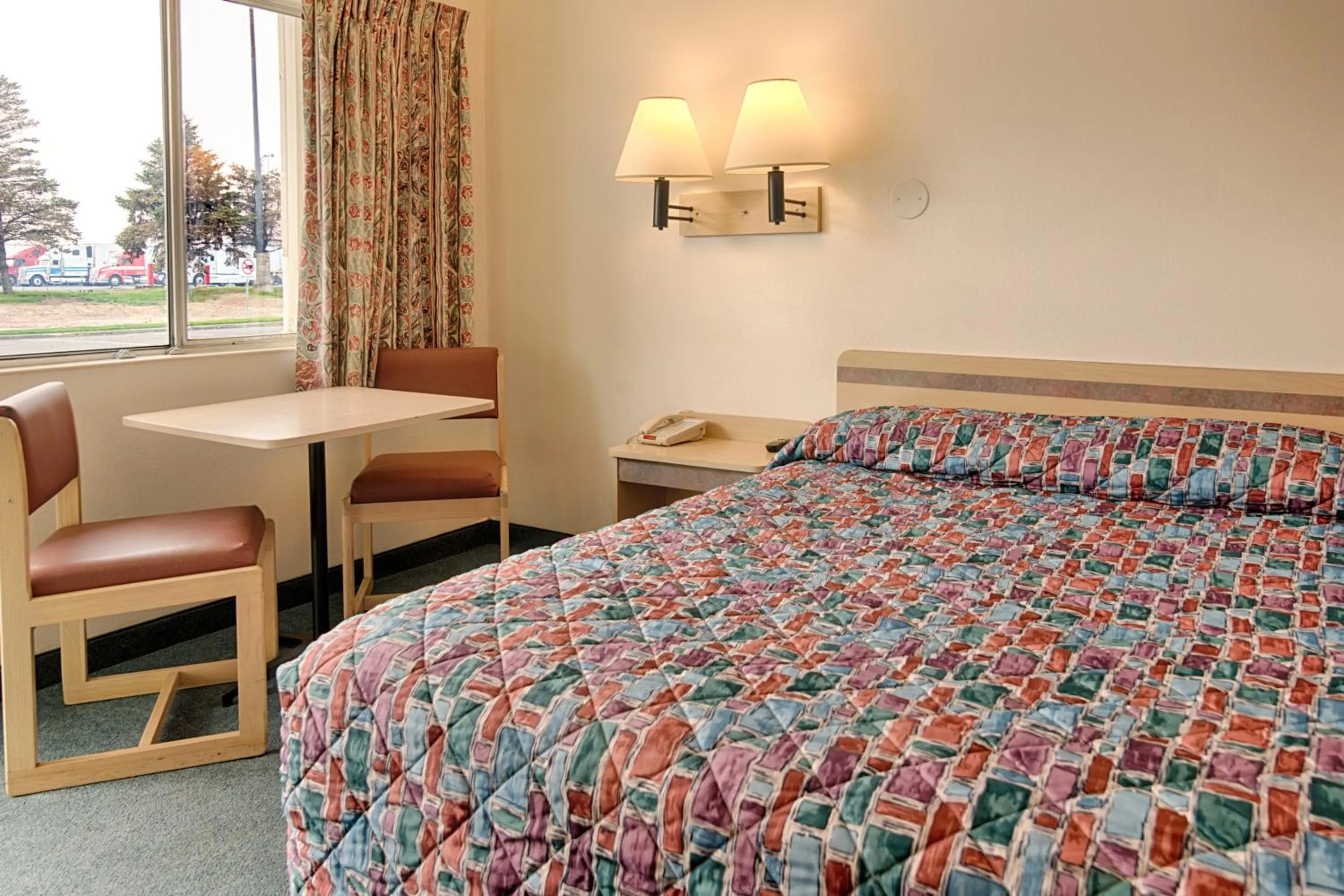 Seating area, Bed in Motel 6-Winnemucca, NV