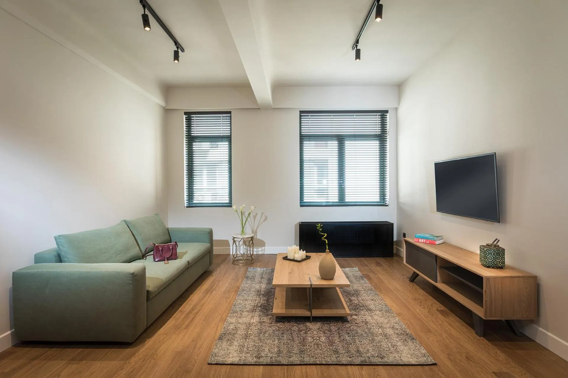 Communal lounge/ TV room in Klepsydra Urban Suites