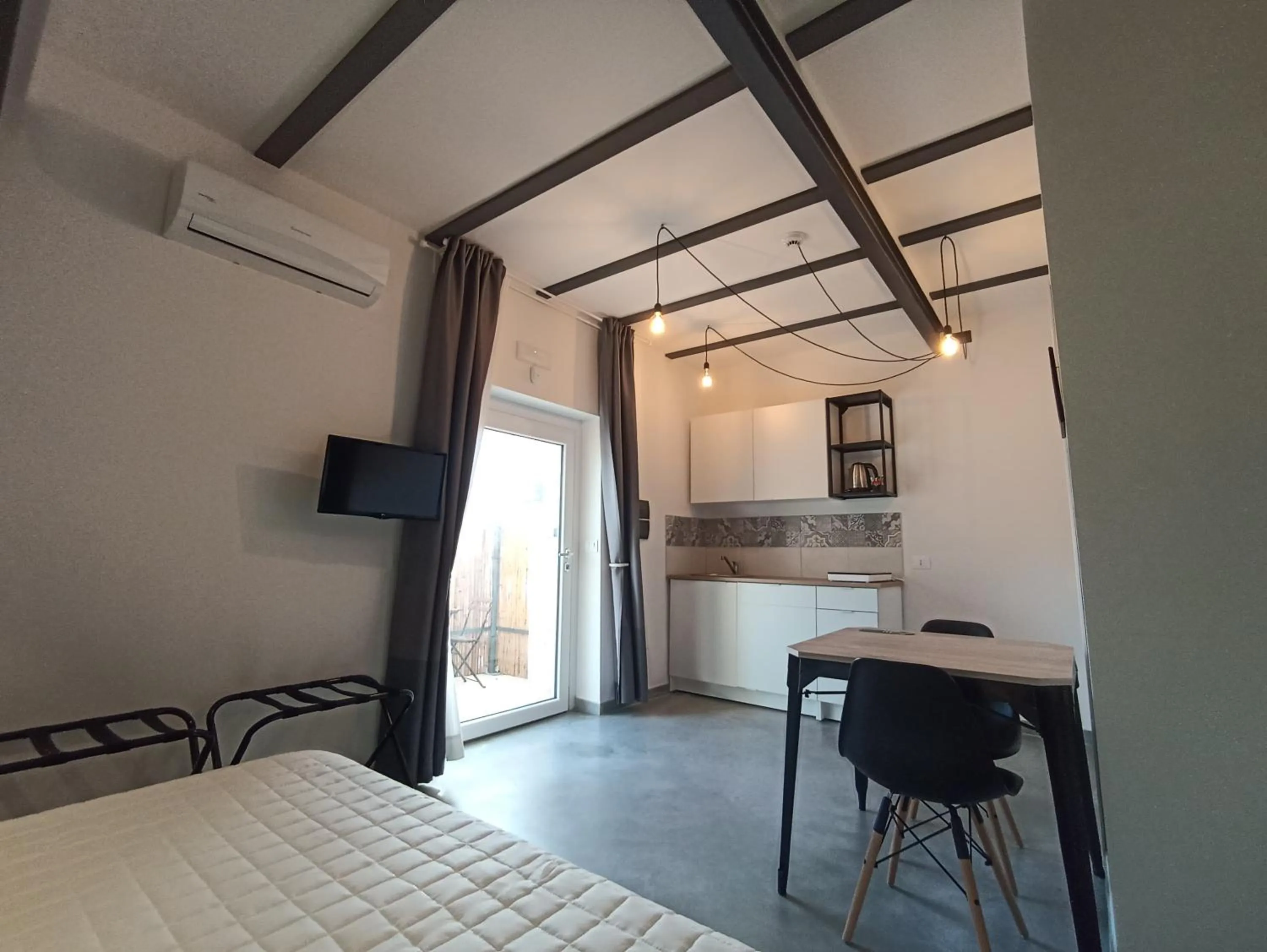 Kitchen or kitchenette in Al Faro Bianco B&B e Residence con parcheggio