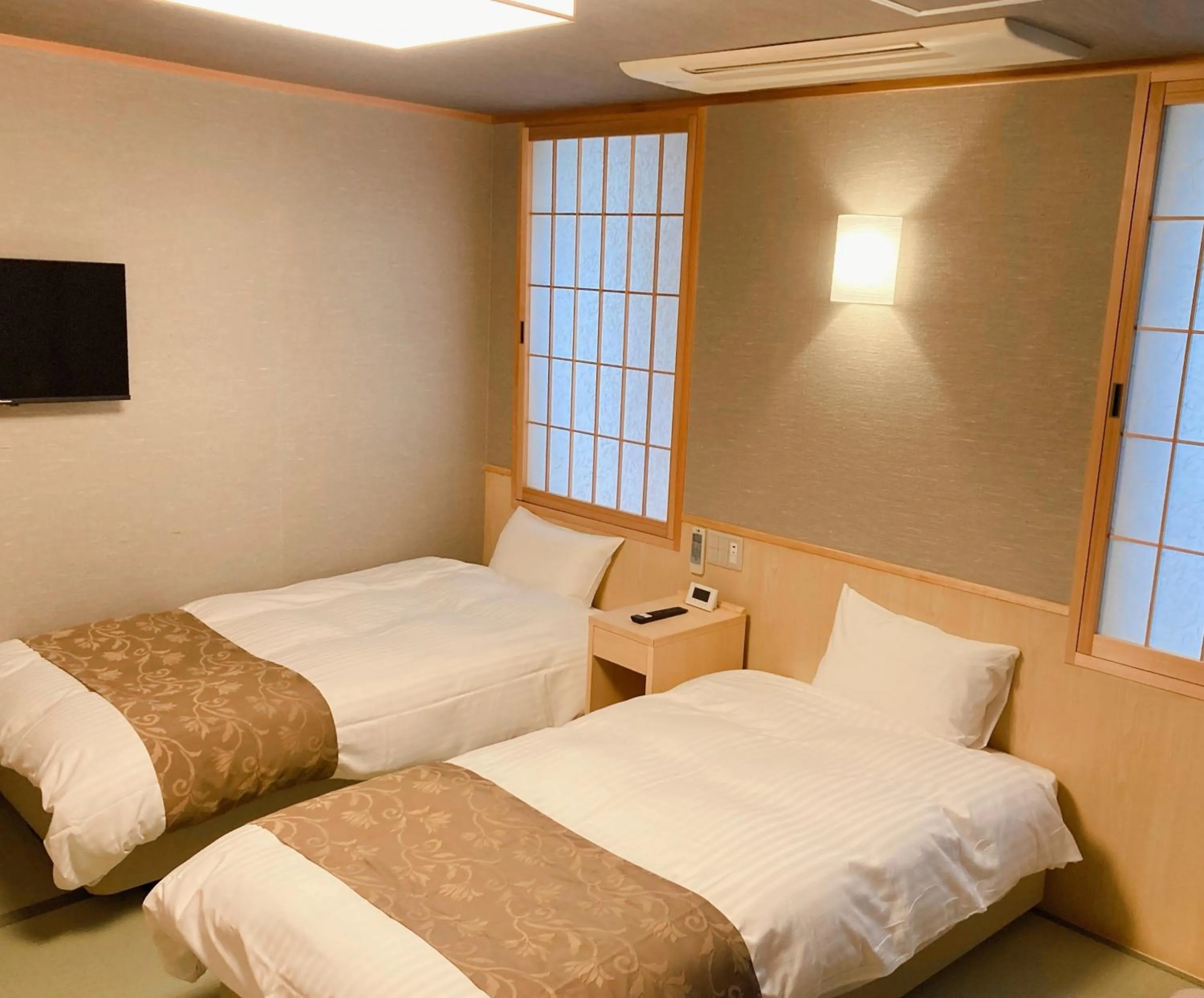 Bed in Hotel Hanakomichi