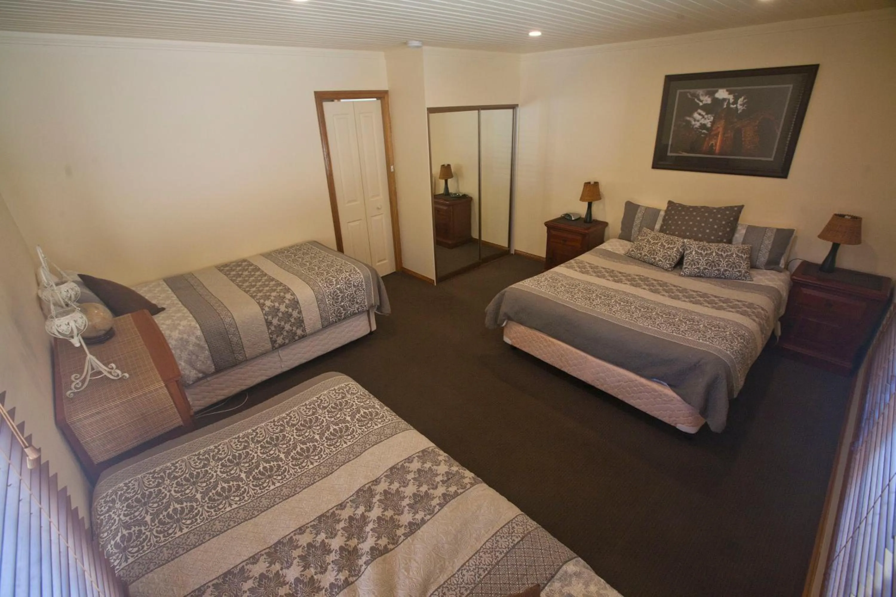 Bed in The Shingles Riverside Cottages