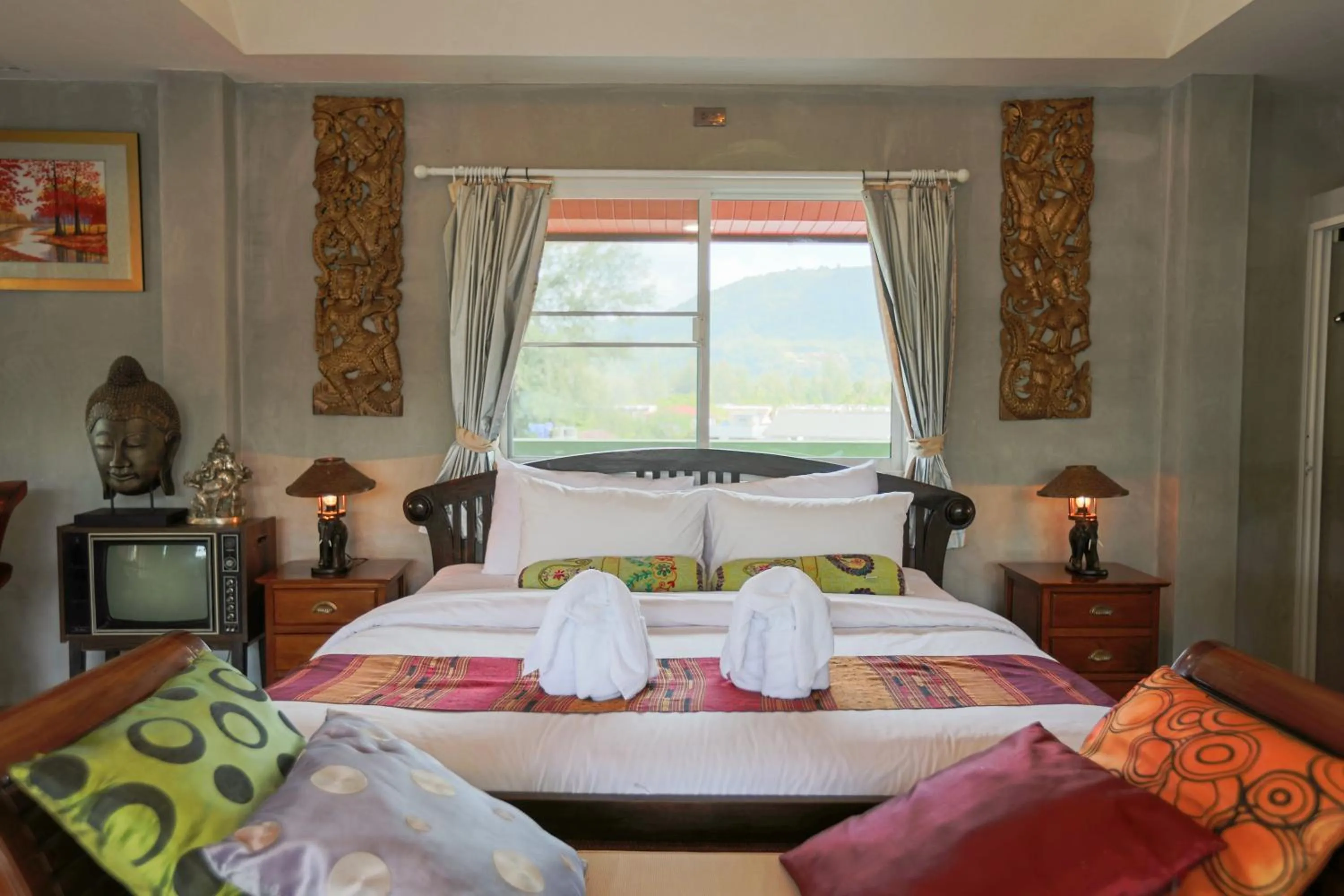 Bed in Baan Kamala Fantasea Hotel