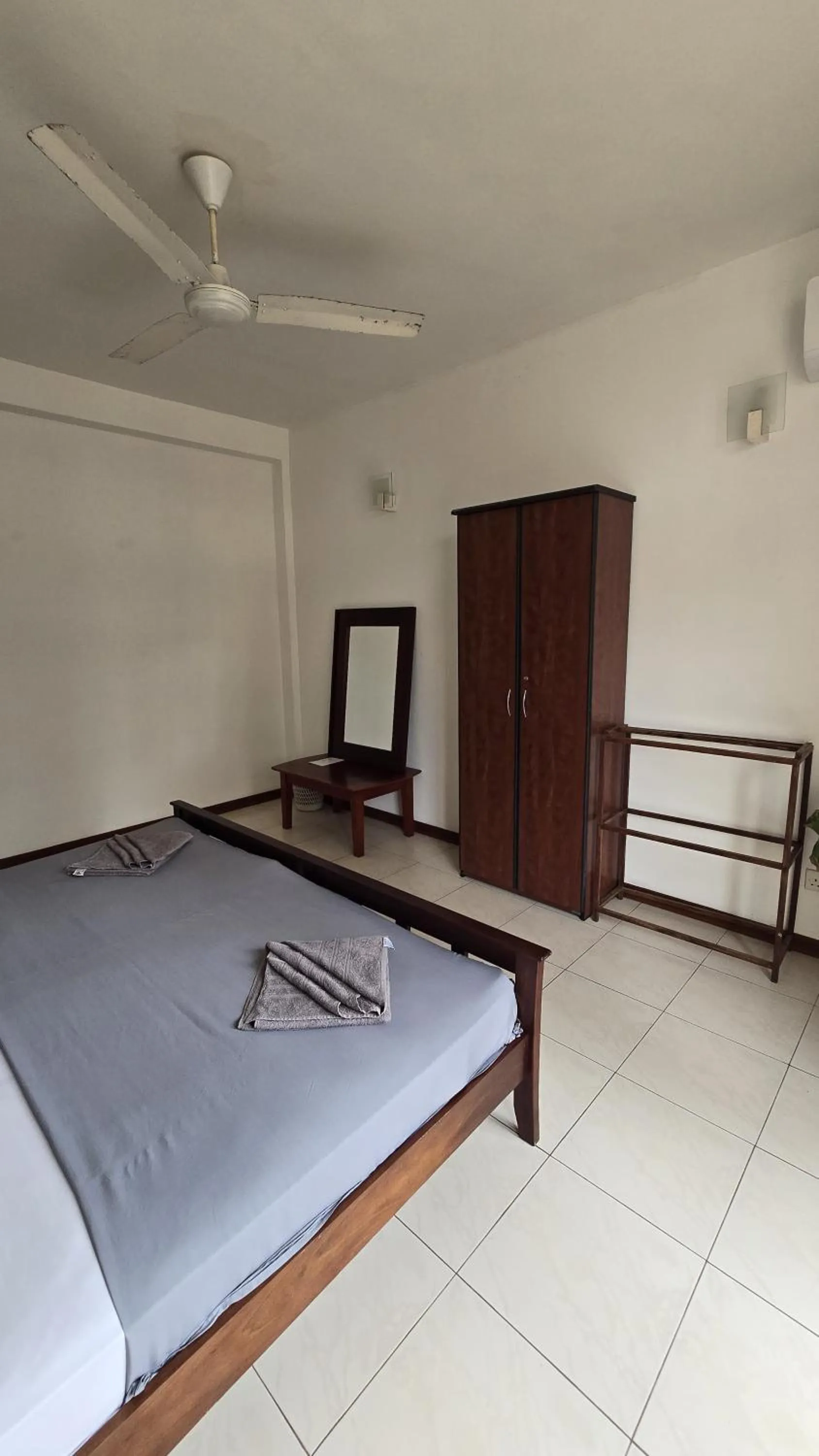 Bed in Palmyrah Residencies