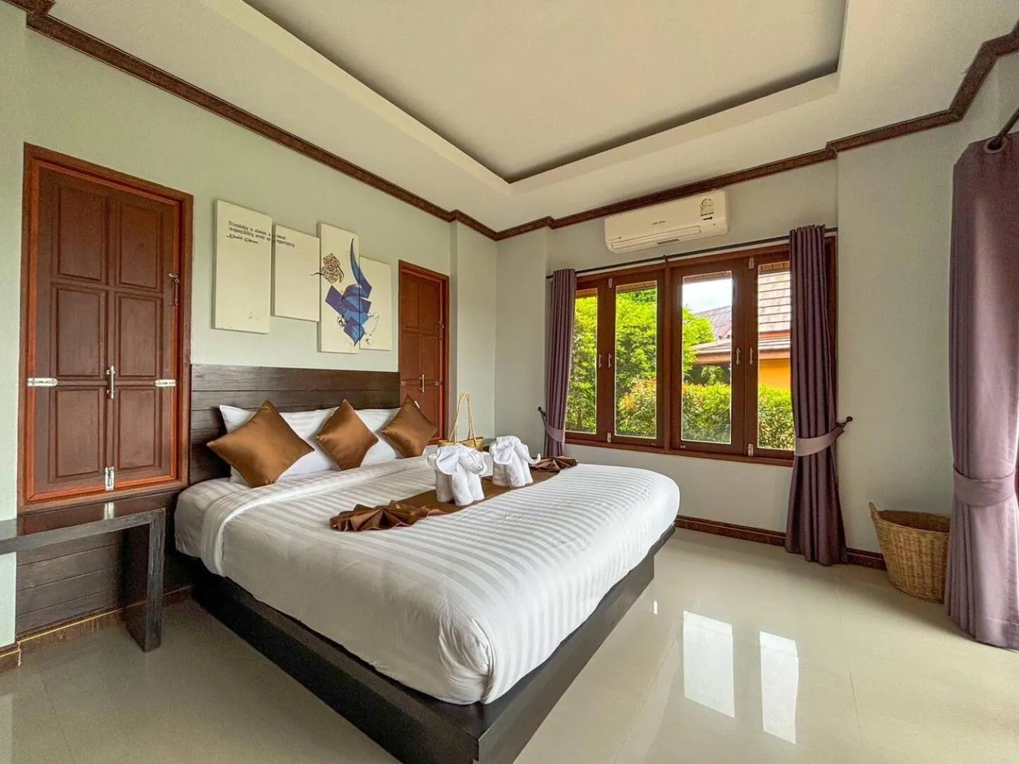 Bed in Puteri Lanta Family Villas