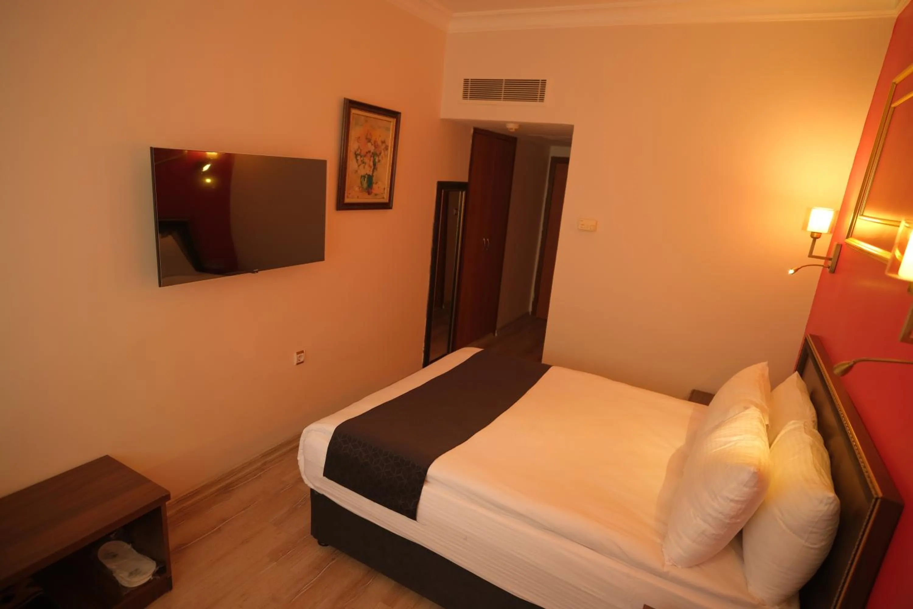 Bedroom, Bed in Malabadi Hotel