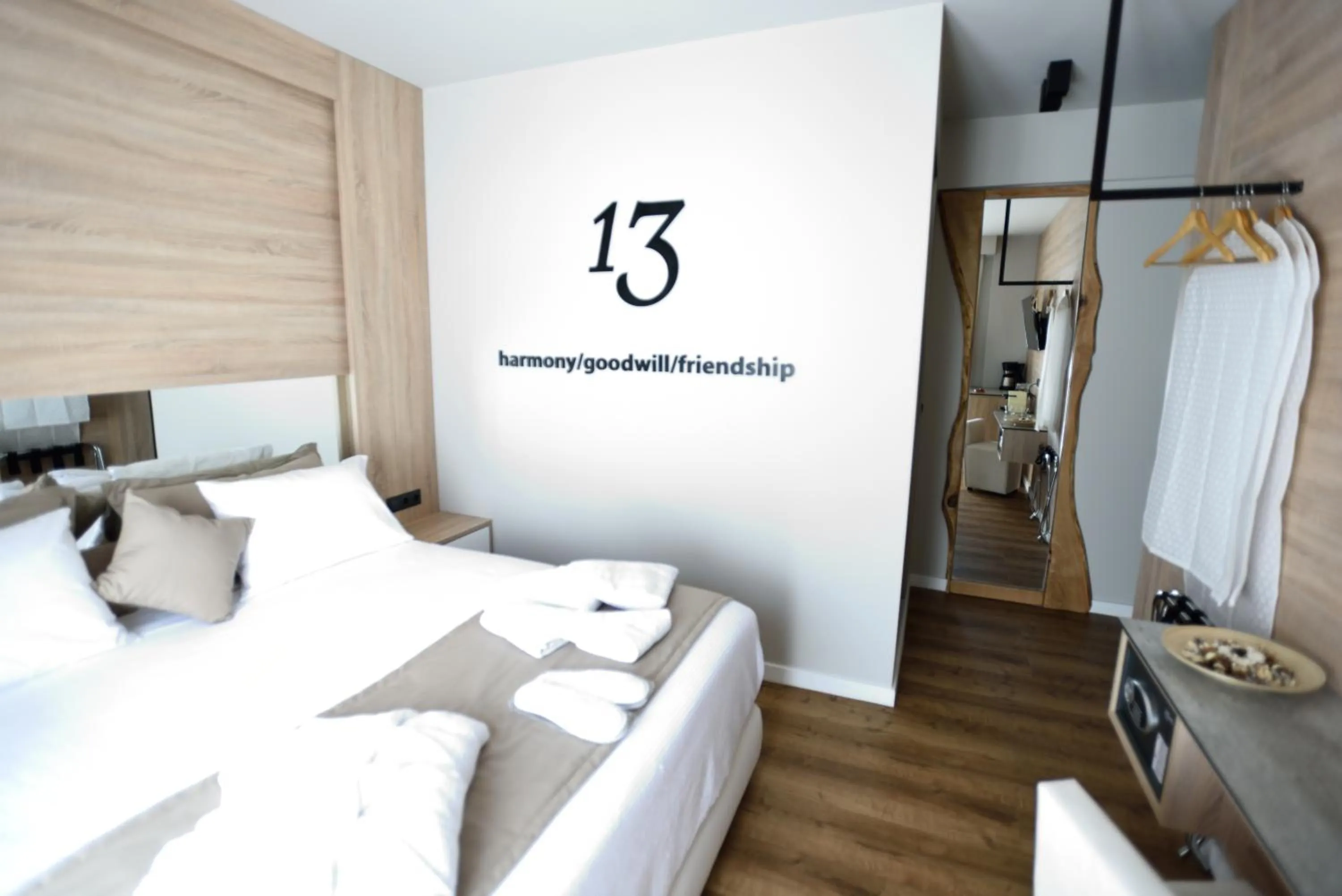 Bed in Magnifique Luxury Suites