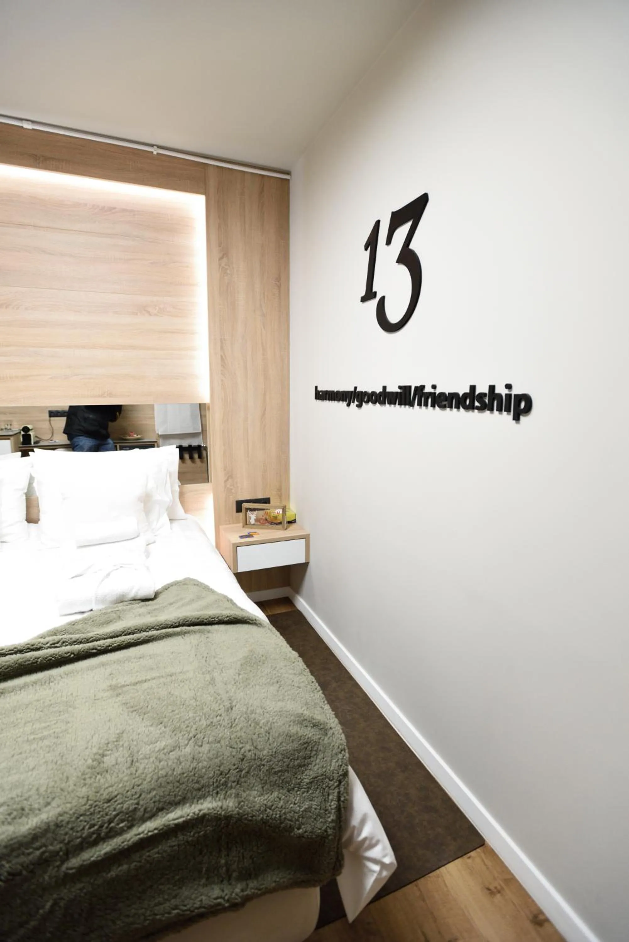 Bed in Magnifique Luxury Suites