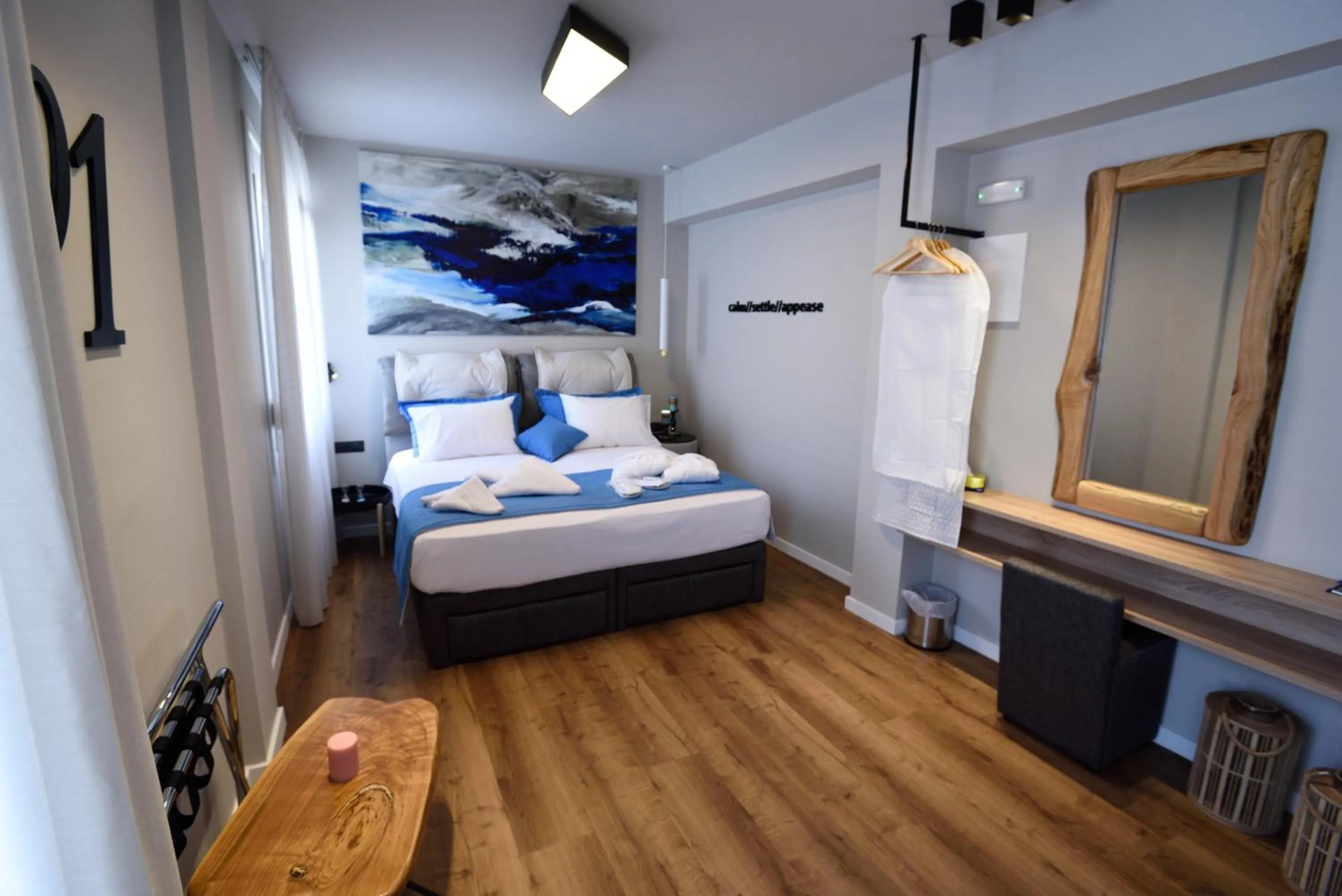 Bed in Magnifique Luxury Suites