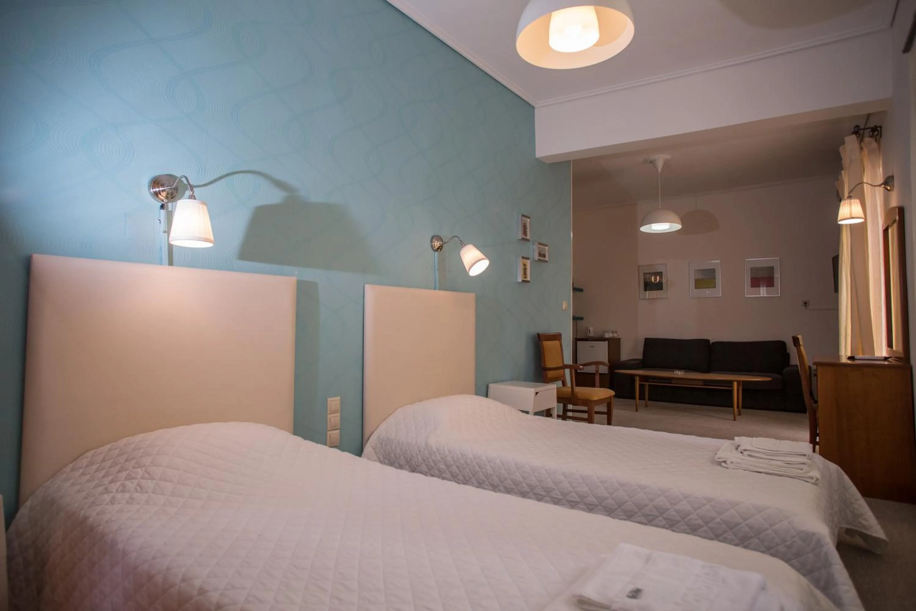 Living room, Bed in Hotel Liberty