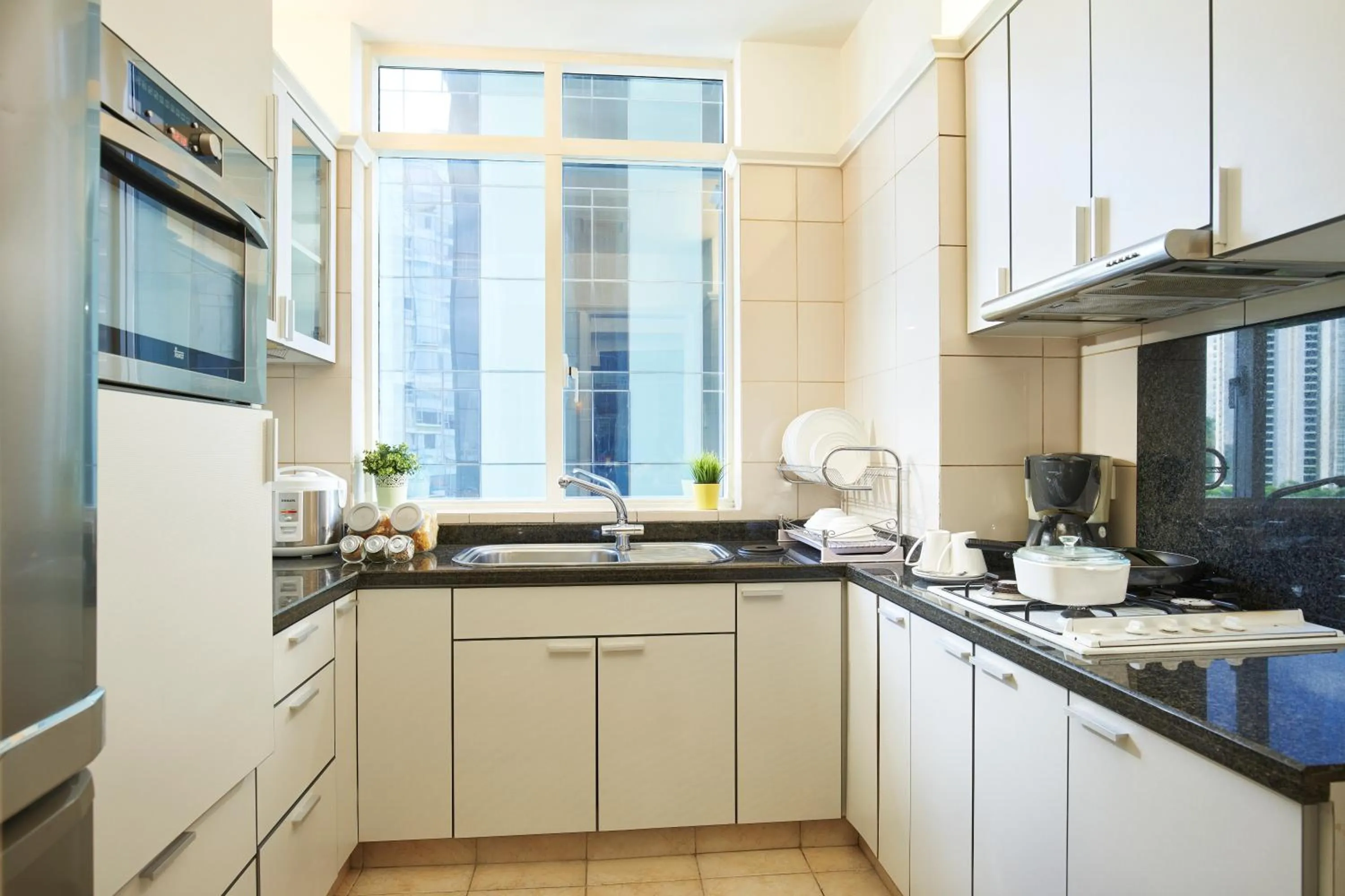 kitchen in Orchard Scotts Residences by Far East Hospitality