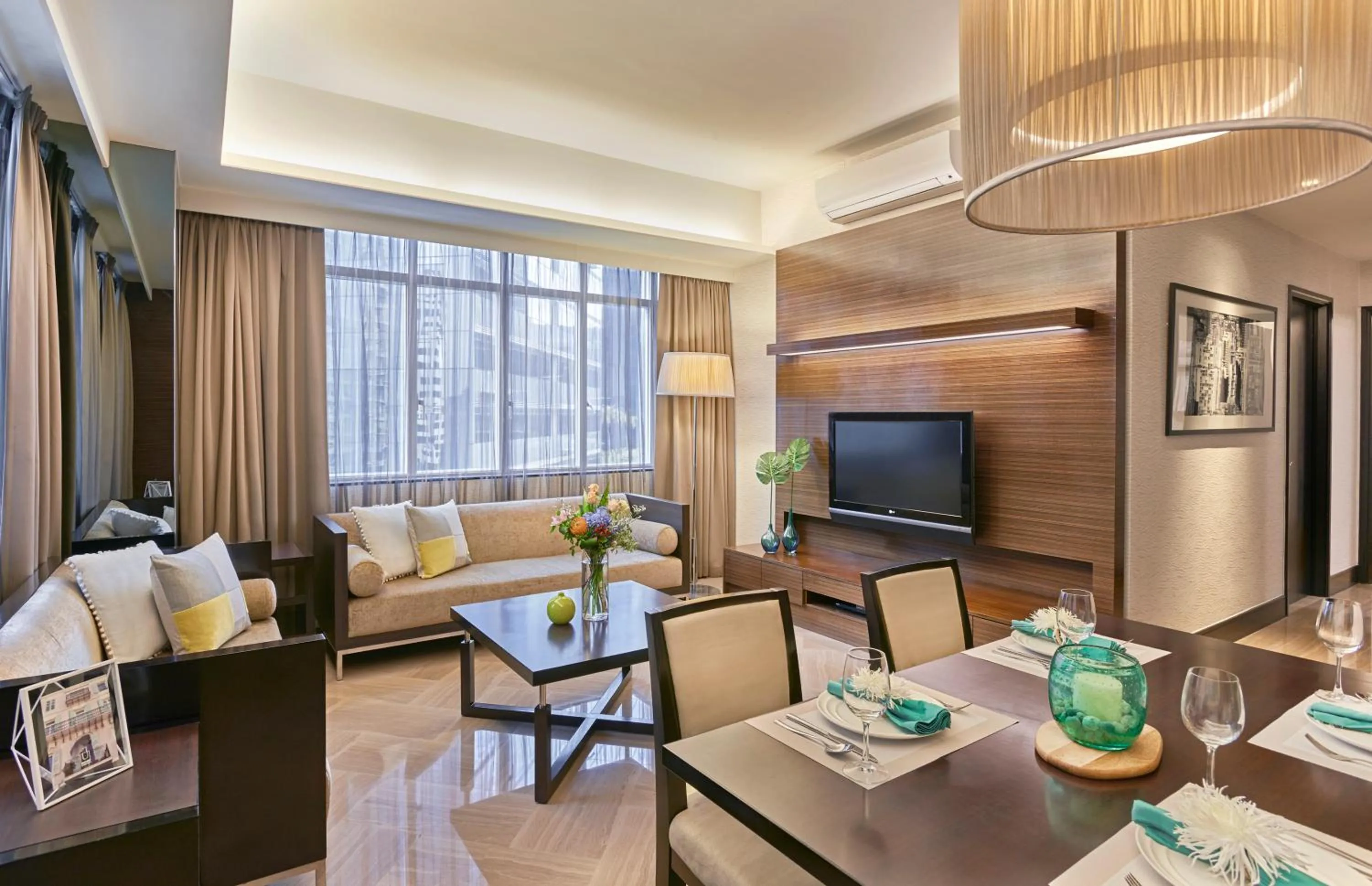 Communal lounge/ TV room in Orchard Scotts Residences by Far East Hospitality