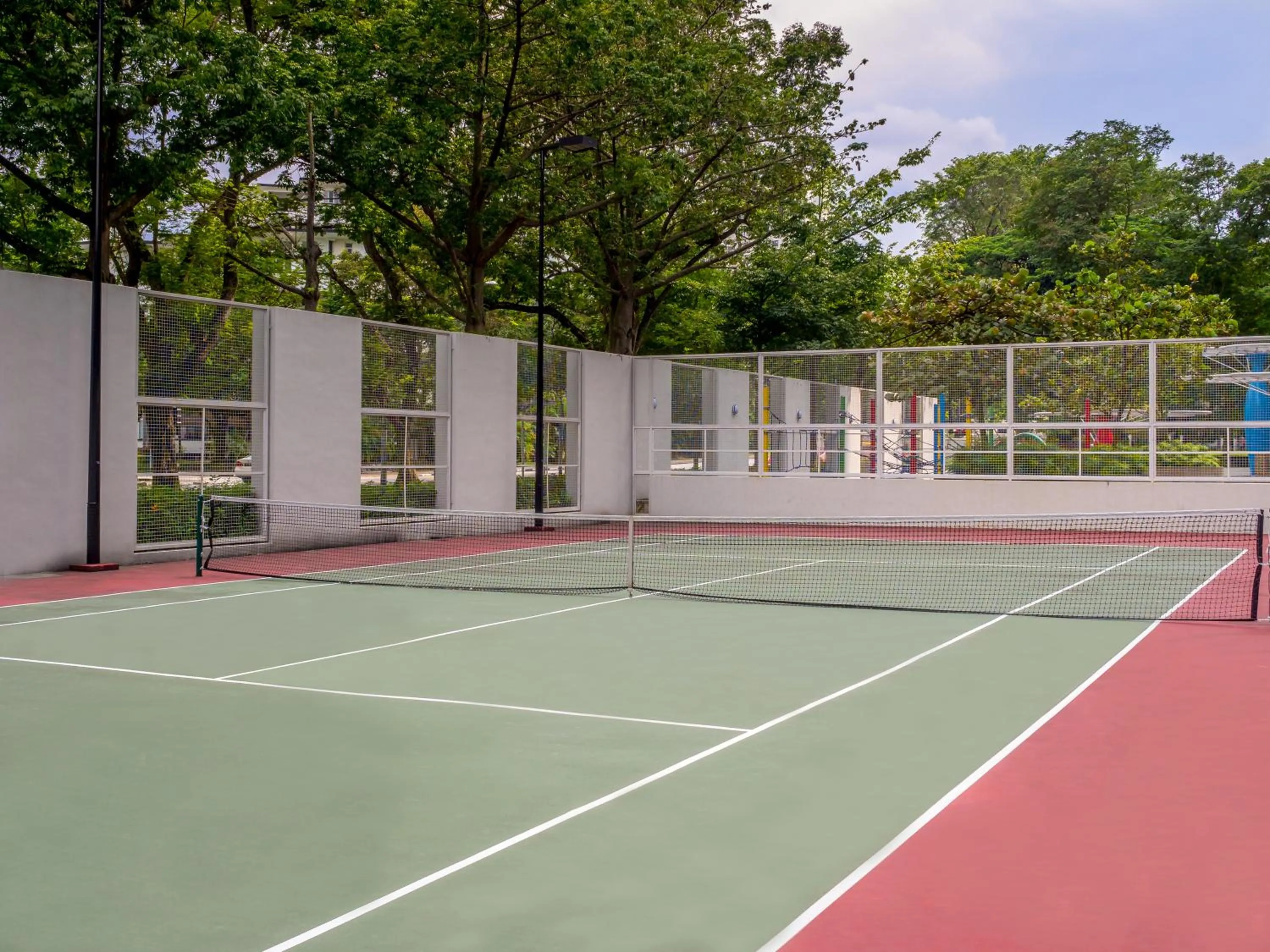 Tennis court in Orchard Scotts Residences by Far East Hospitality