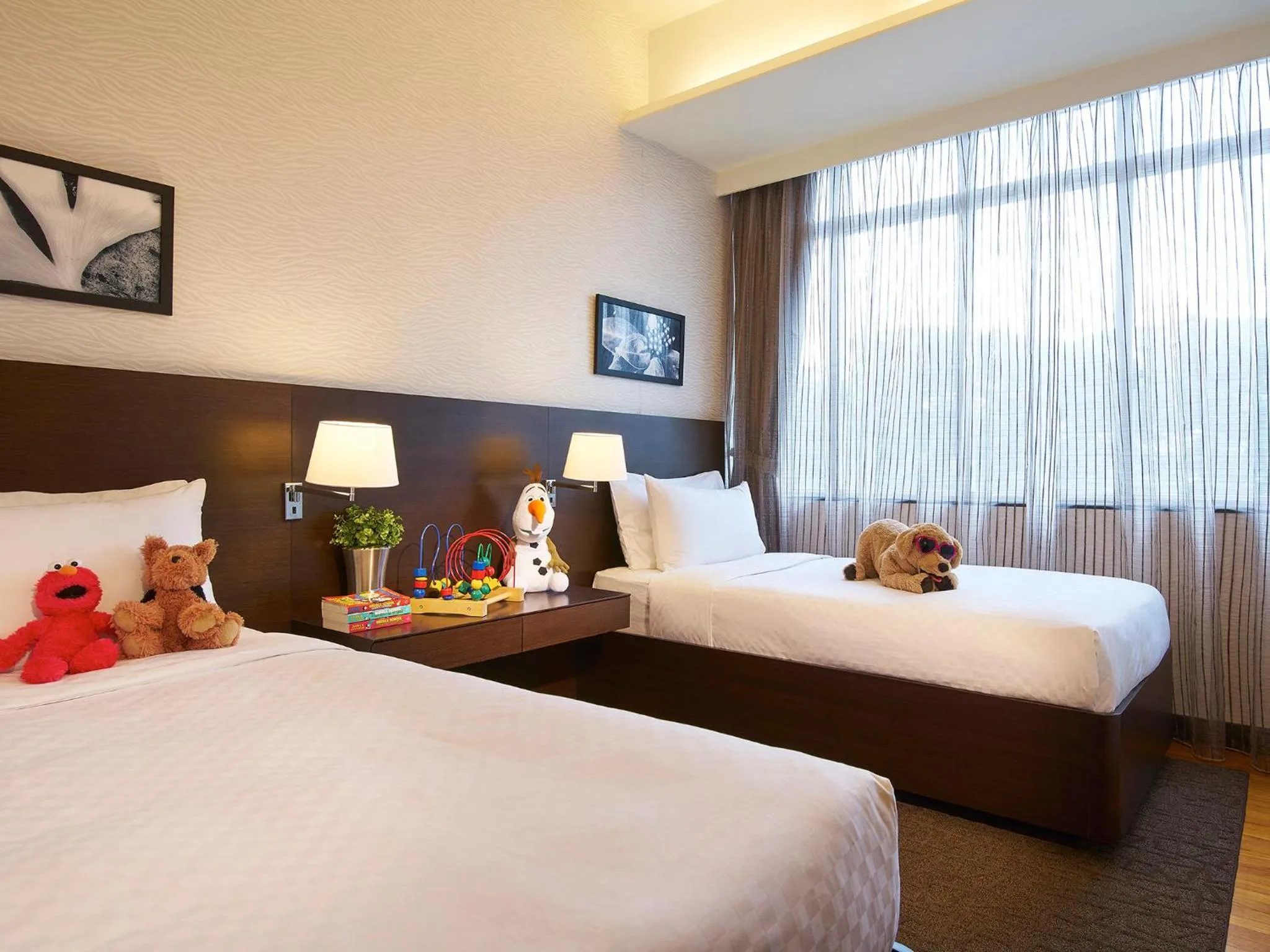 Bed in Orchard Scotts Residences by Far East Hospitality