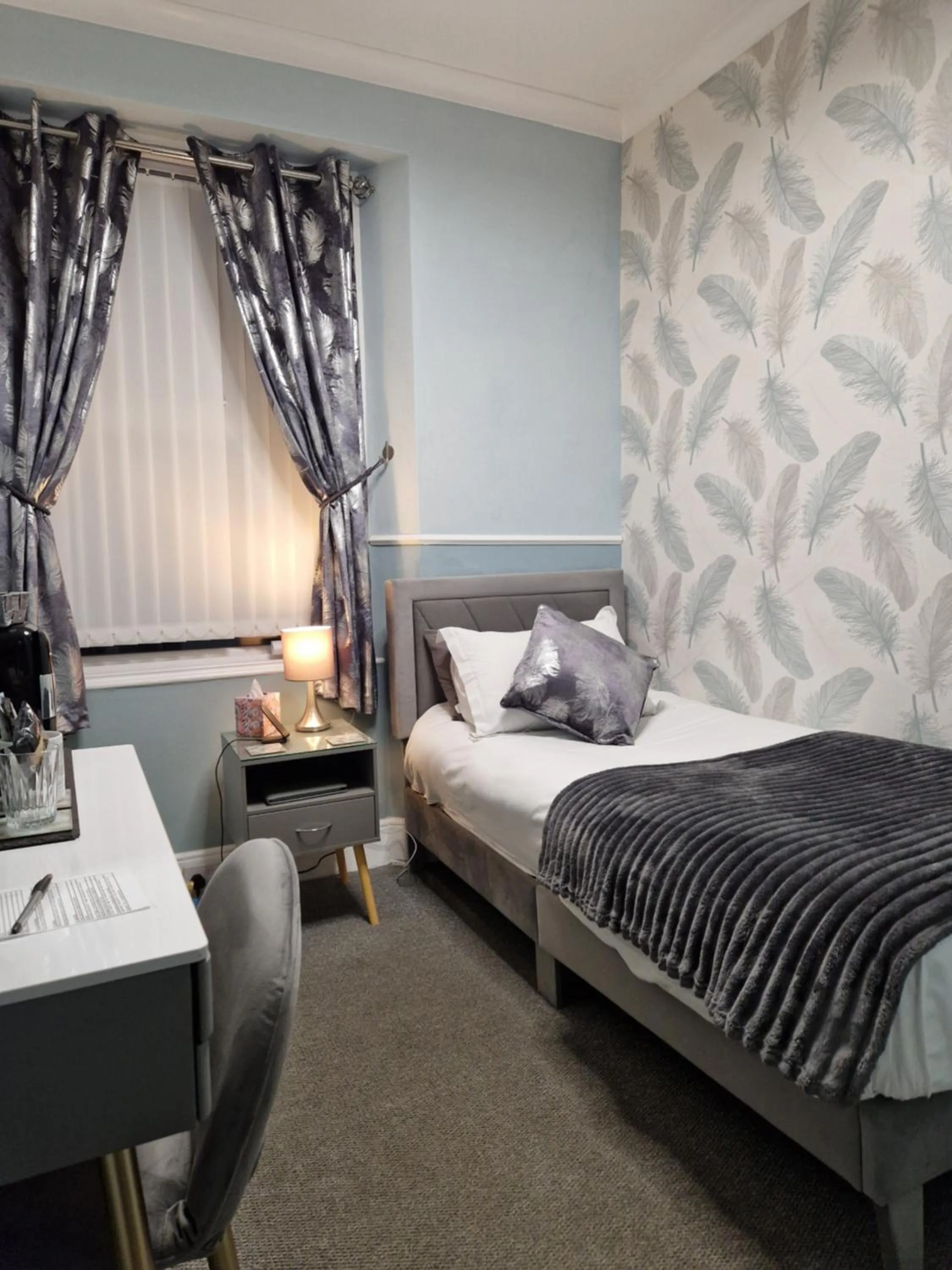 Coffee/tea facilities, Bed in Ambassador Guest House