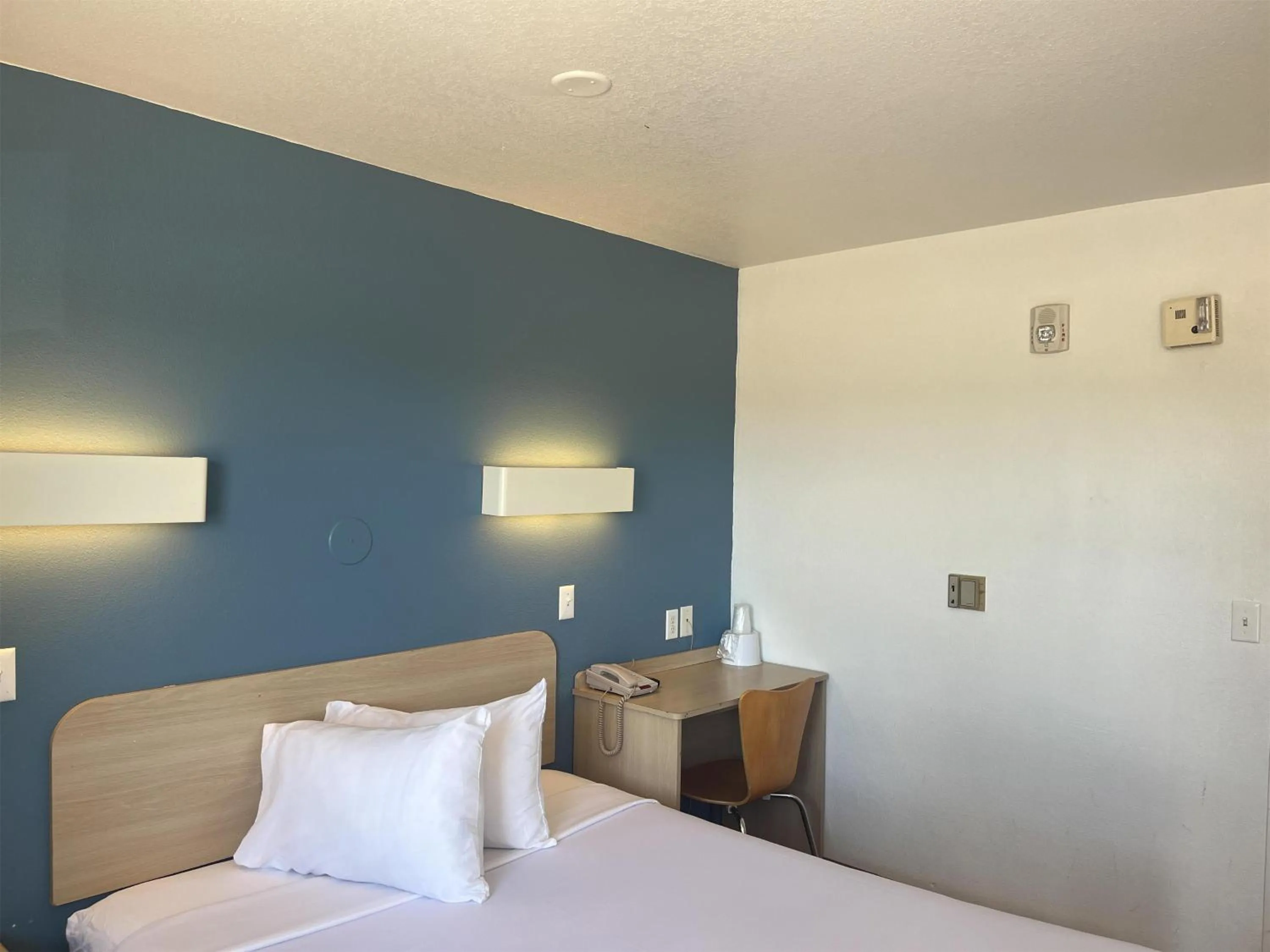 Bathroom, Bed in Motel 6 Fort Collins, CO