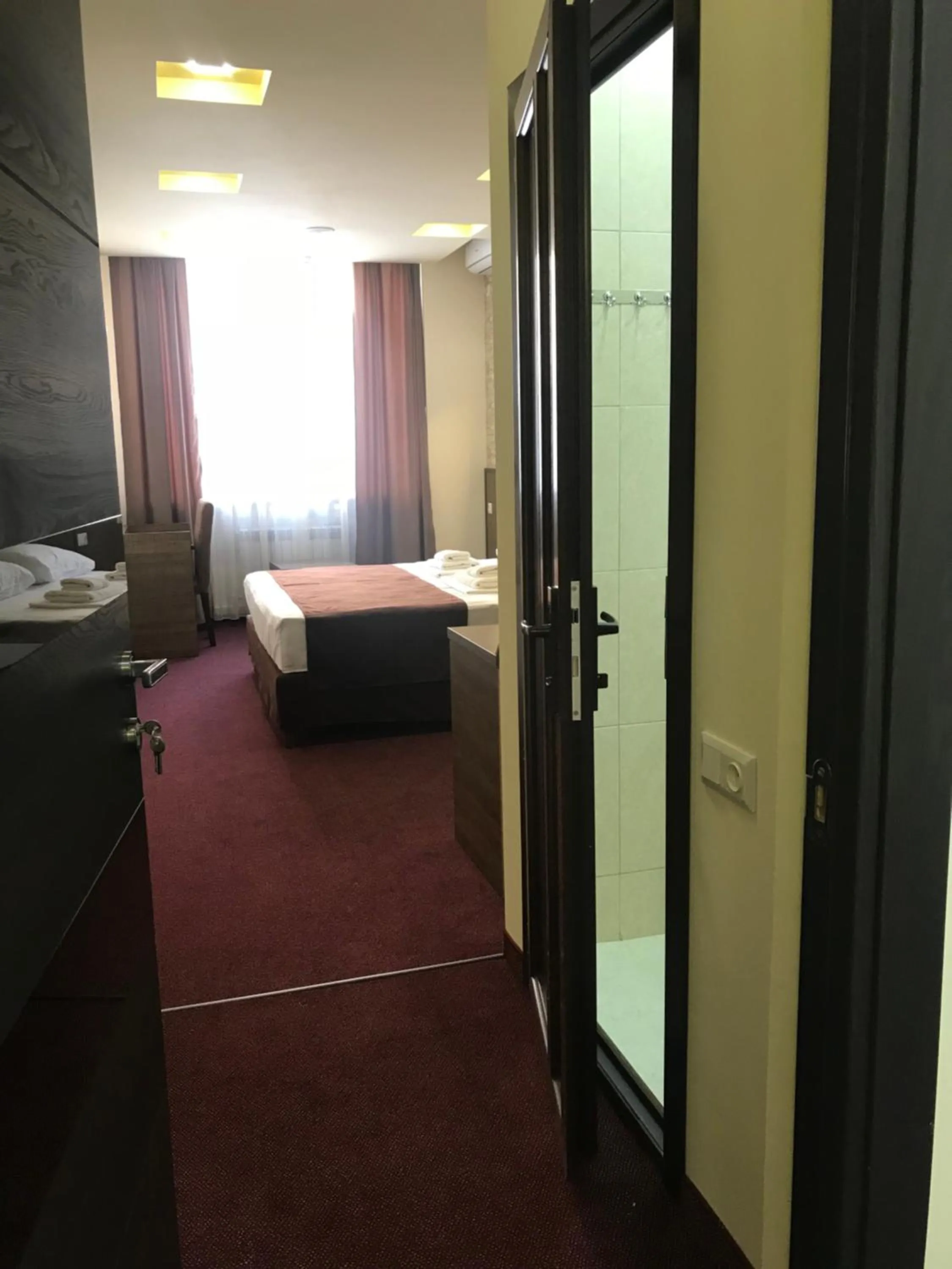 Photo of the whole room, Bed in Hobby Hotel