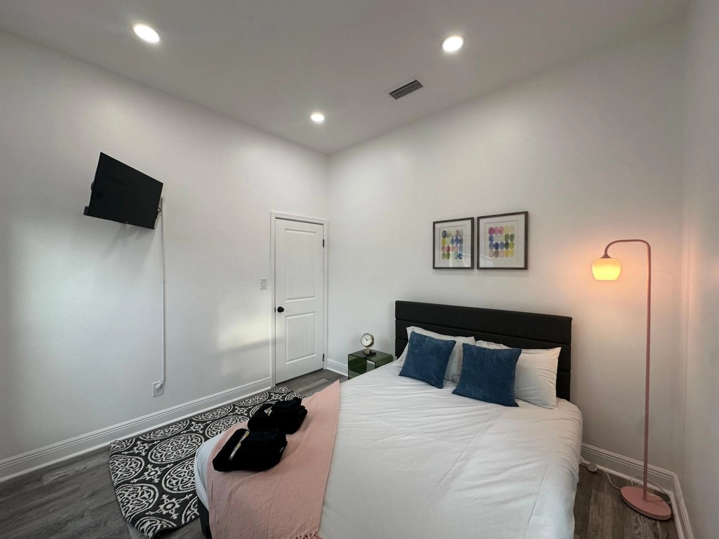 Bed in 30-A Inn & Suites