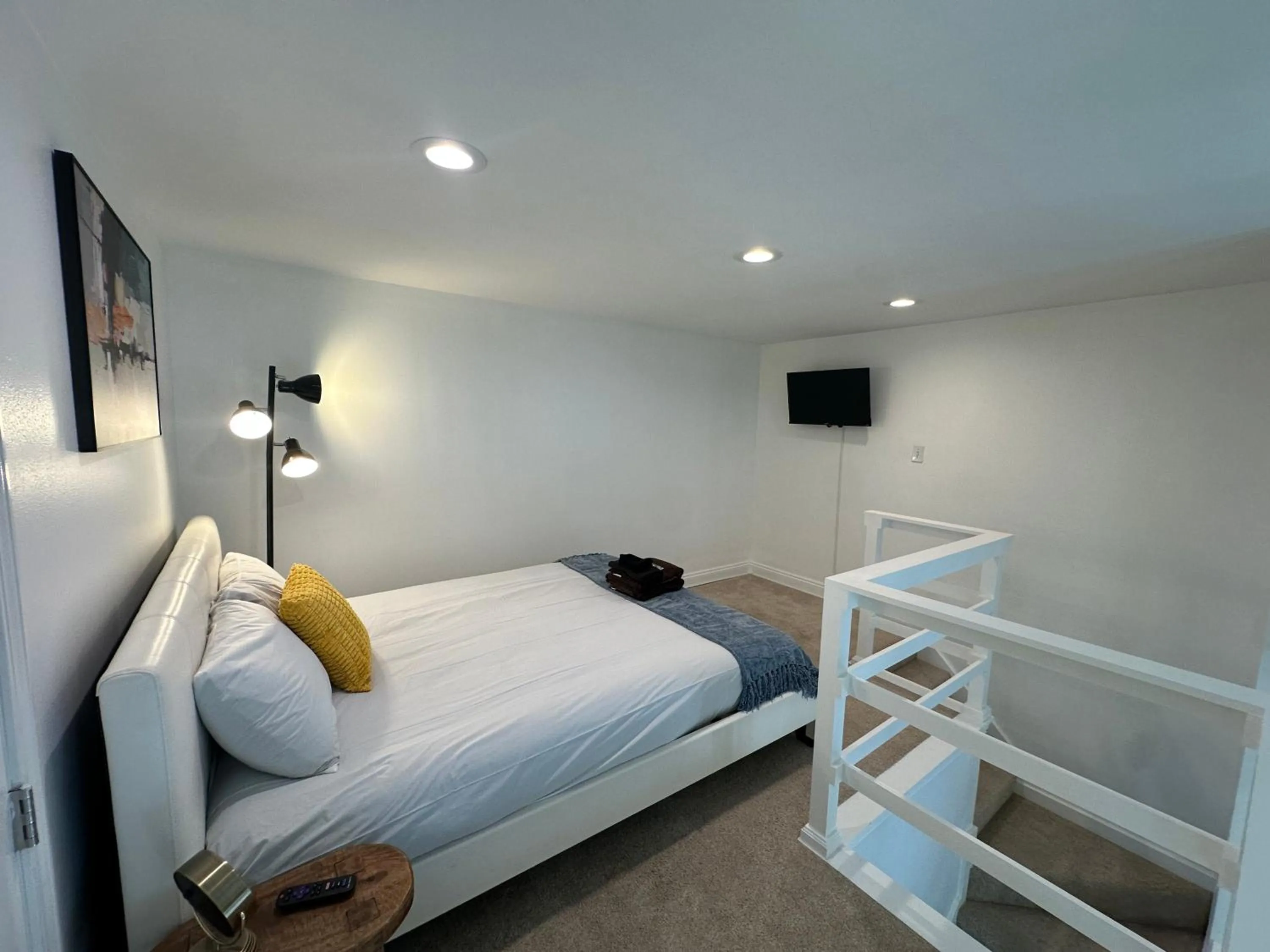 Bed in 30-A Inn & Suites