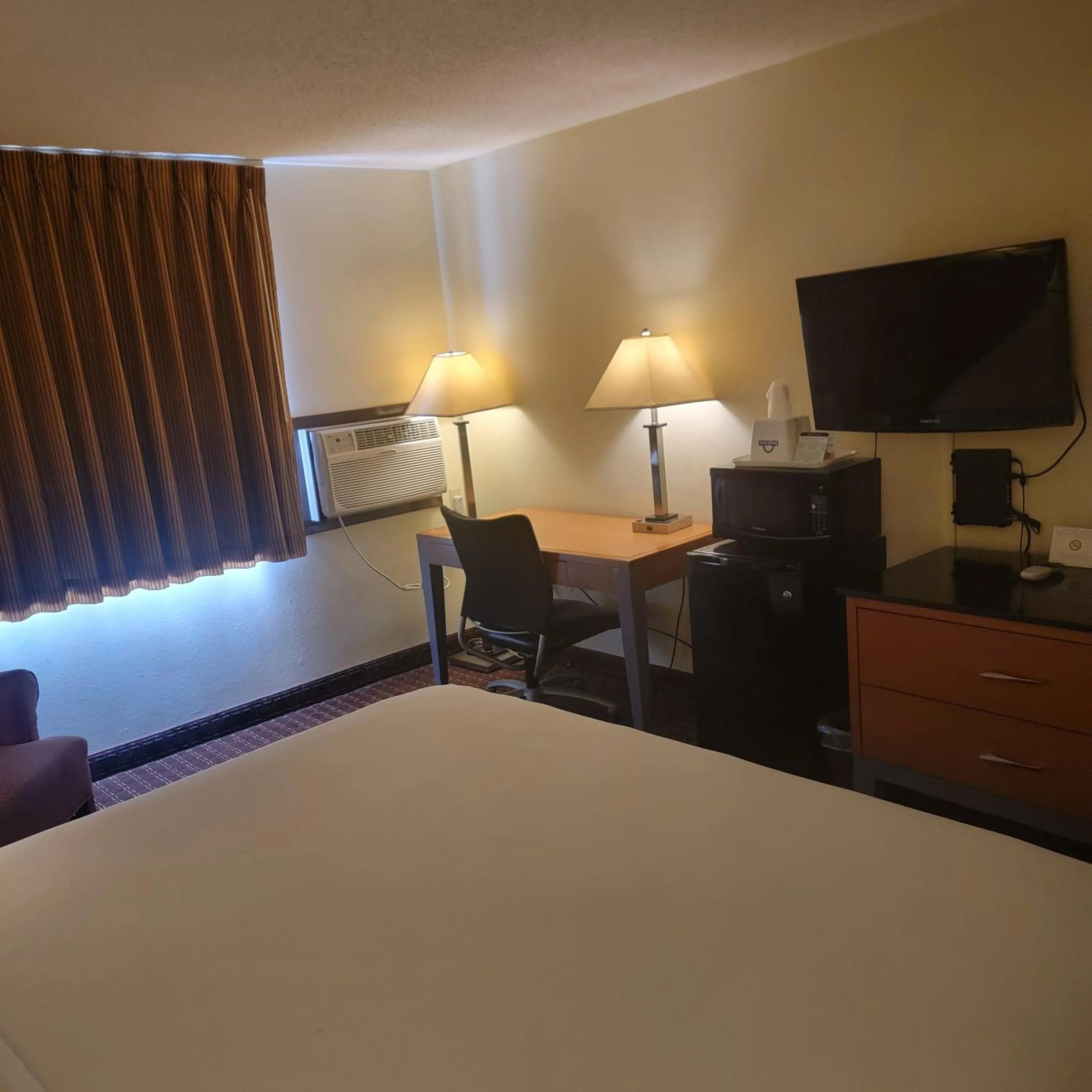 Bed in Days Inn by Wyndham Fort Dodge