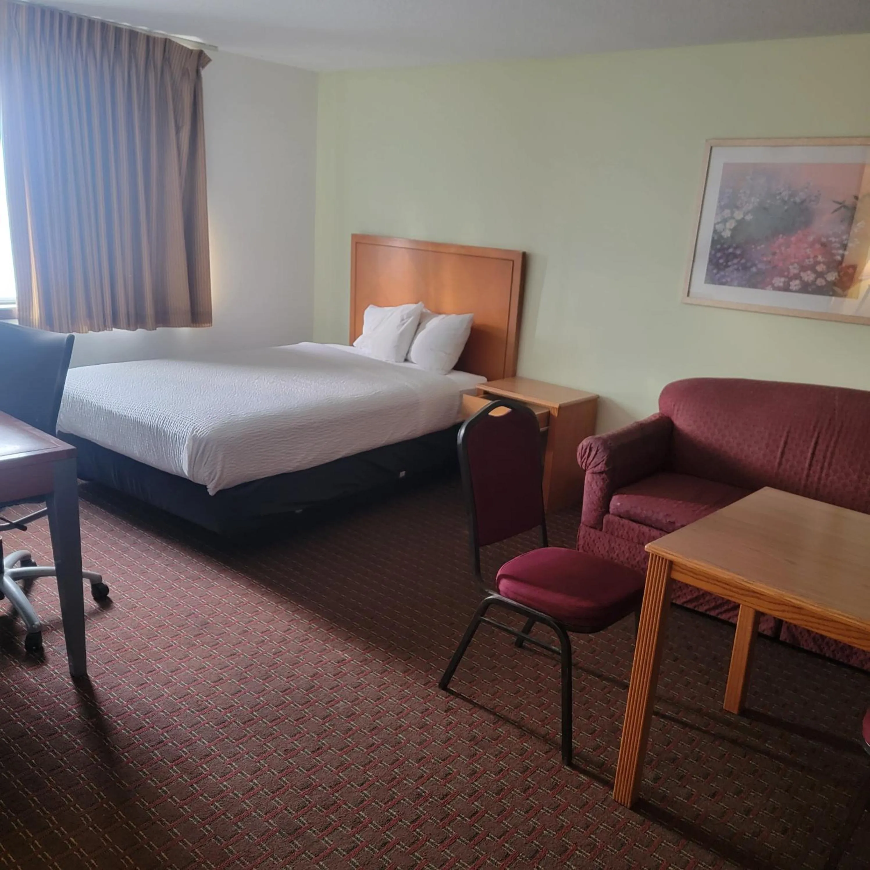 Bed in Days Inn by Wyndham Fort Dodge