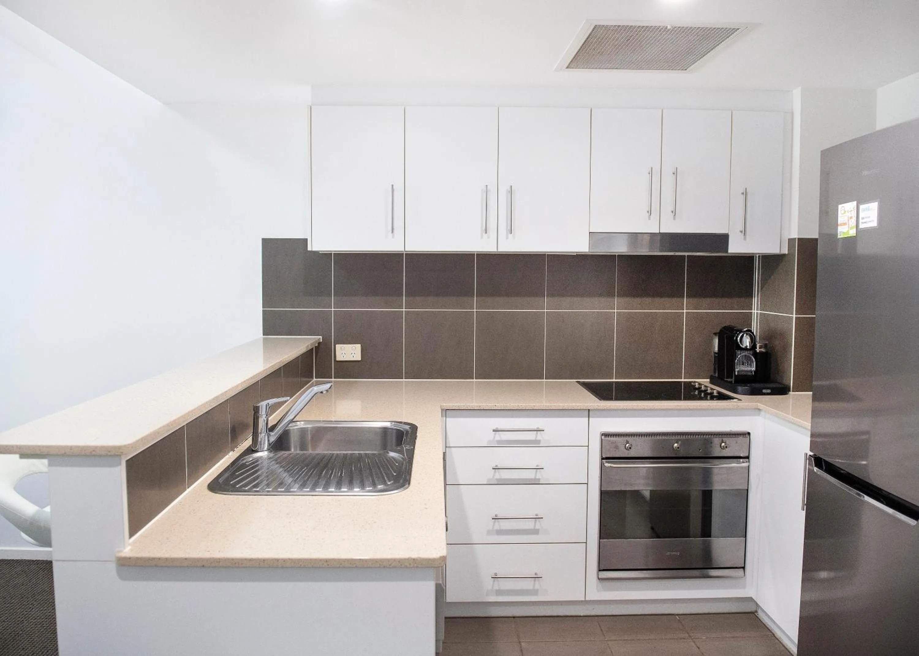Kitchen or kitchenette in Swell Resort Burleigh Heads
