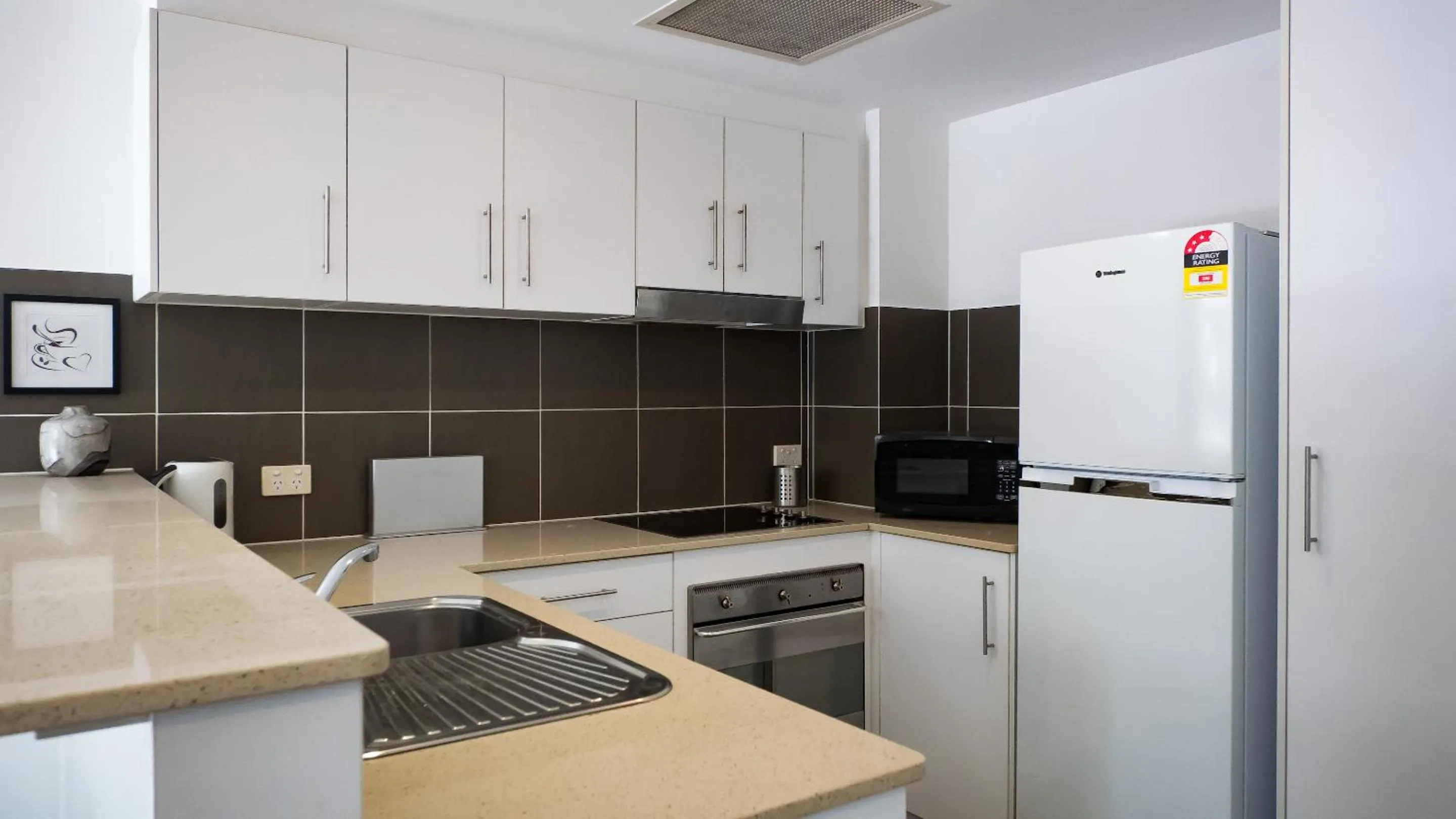 Kitchen or kitchenette in Swell Resort Burleigh Heads