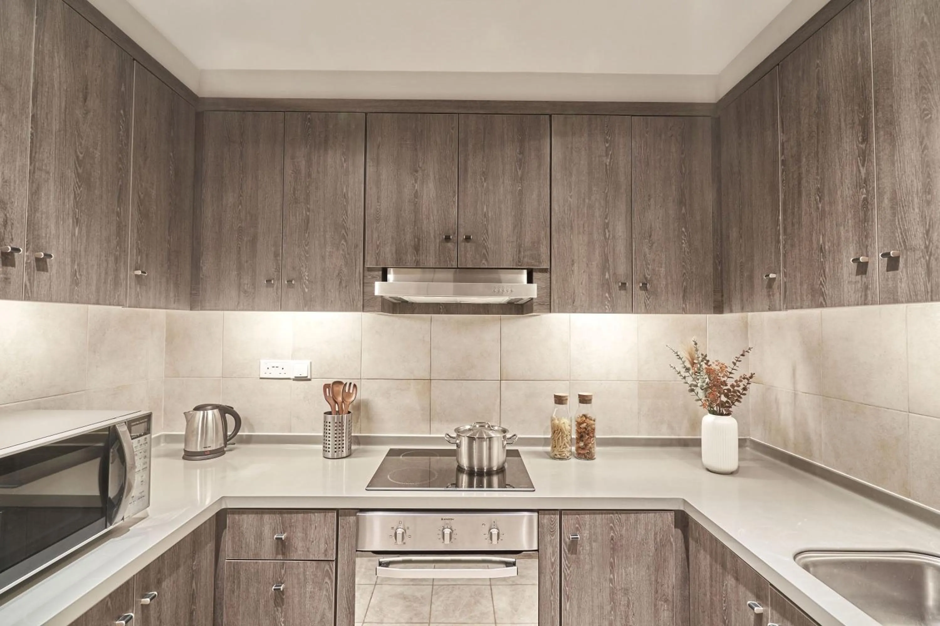 Kitchen or kitchenette in Adina Serviced Apartments Singapore Orchard