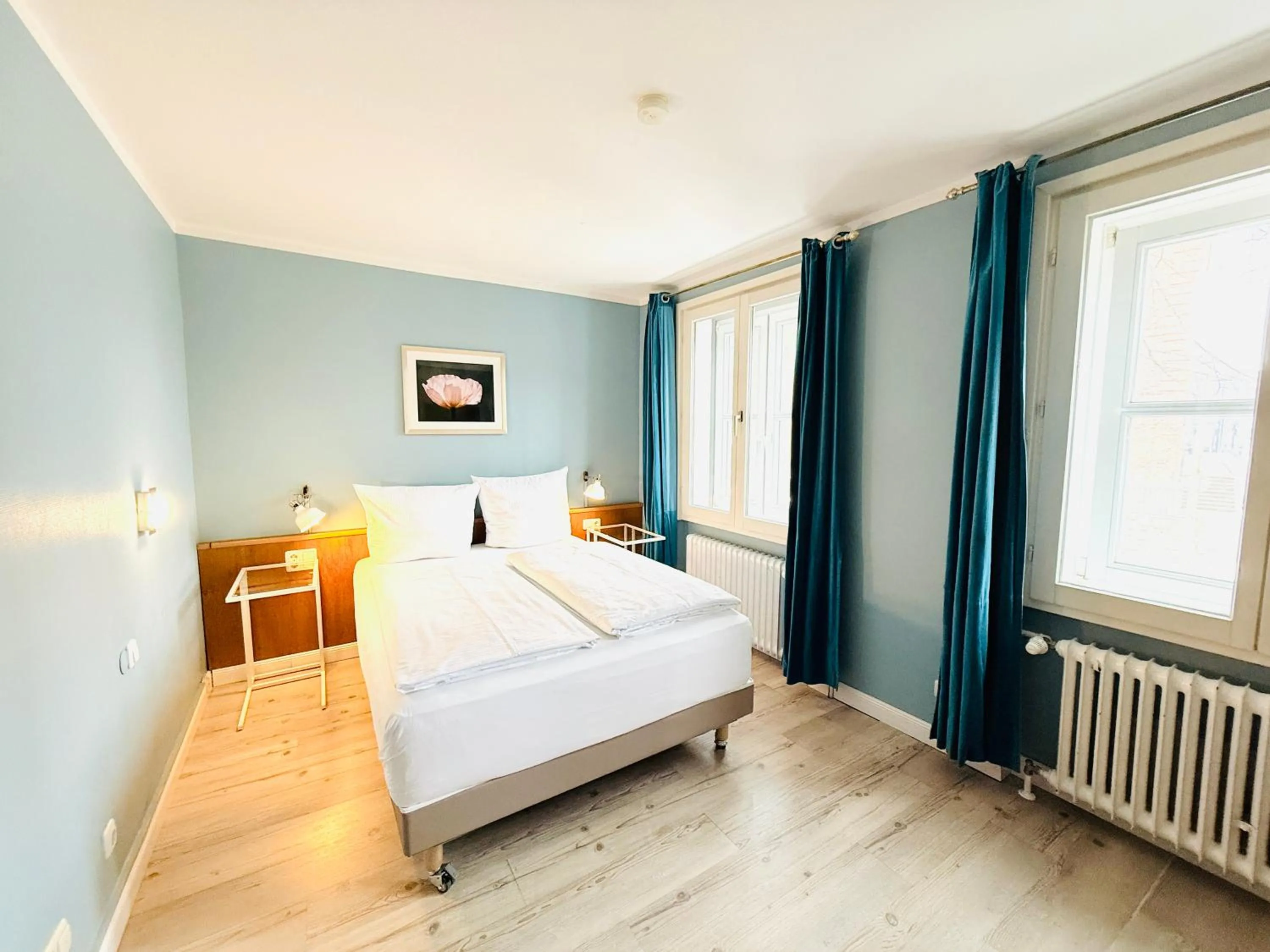 Photo of the whole room, Bed in Hotel Pelli Hof Rendsburg by Tulip Inn