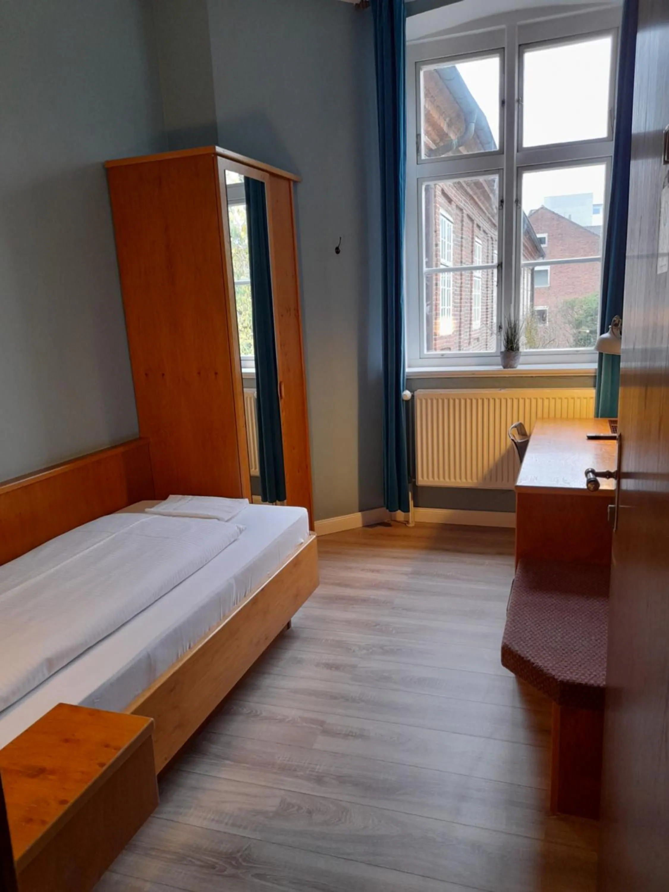 Bed in Hotel Pelli Hof Rendsburg by Tulip Inn