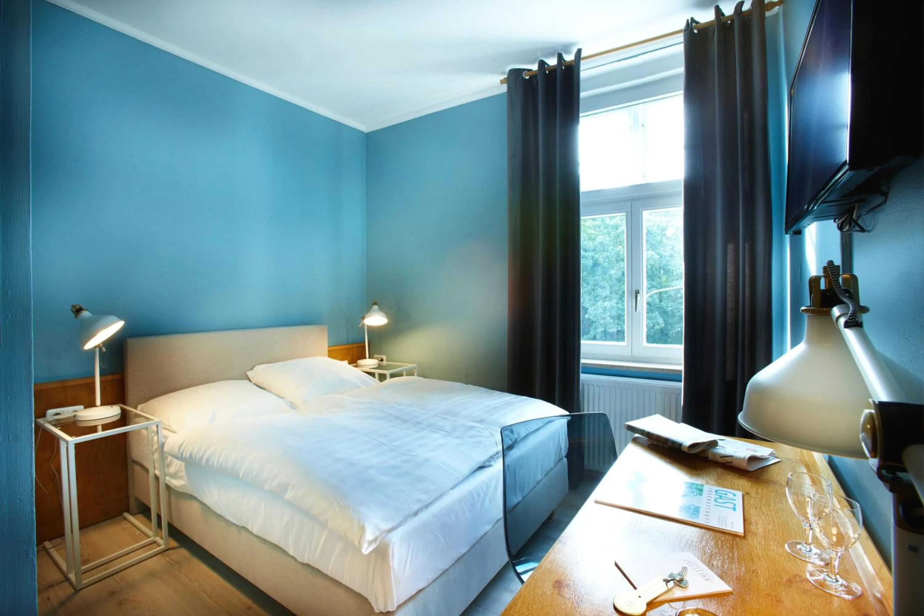 Photo of the whole room, Bed in Hotel Pelli Hof Rendsburg by Tulip Inn