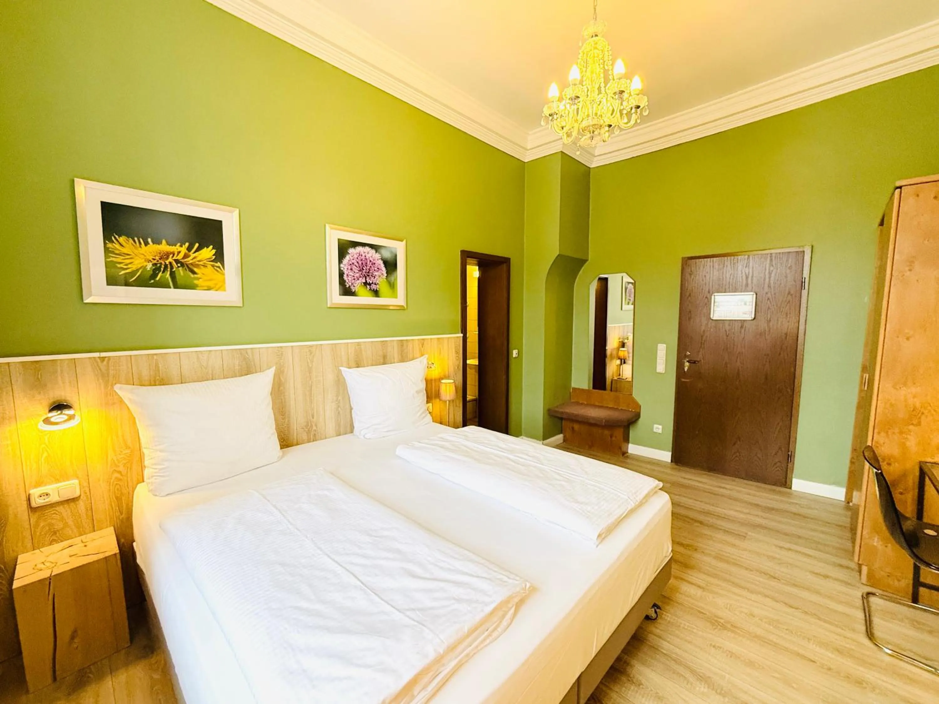 Photo of the whole room, Bed in Hotel Pelli Hof Rendsburg by Tulip Inn