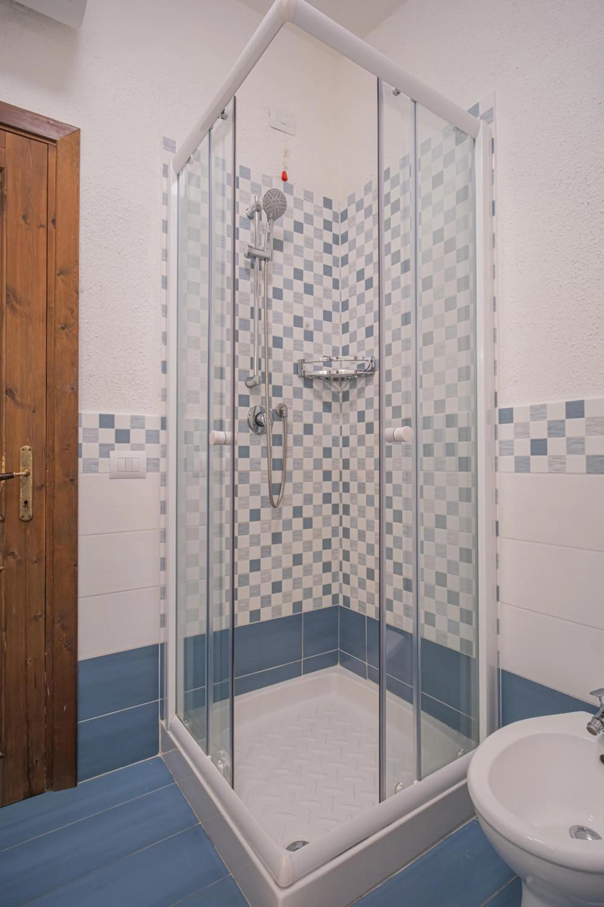 Shower in Felix Hotels - Residence Hotel Costa Serena