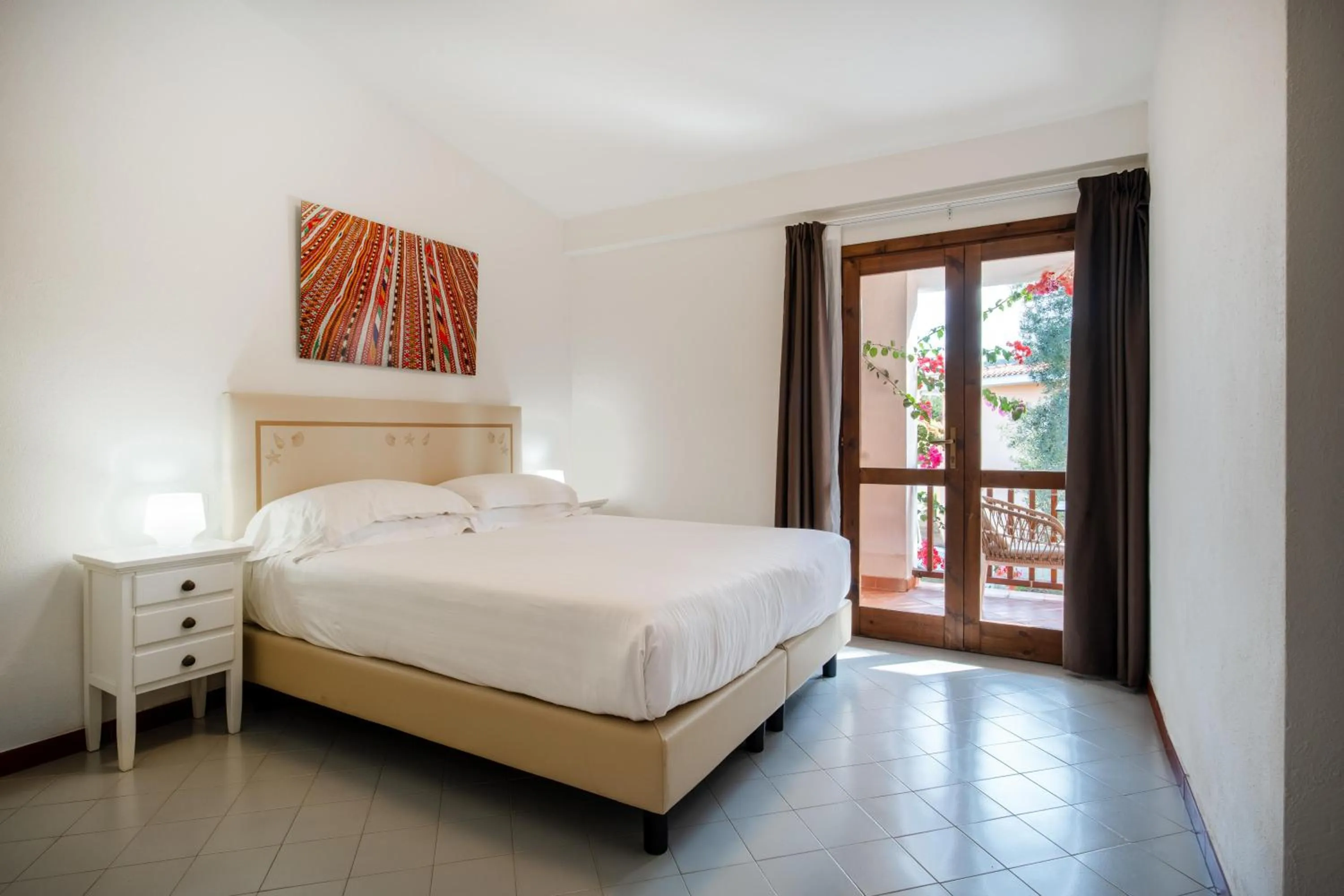 Bed in Felix Hotels - Residence Hotel Costa Serena