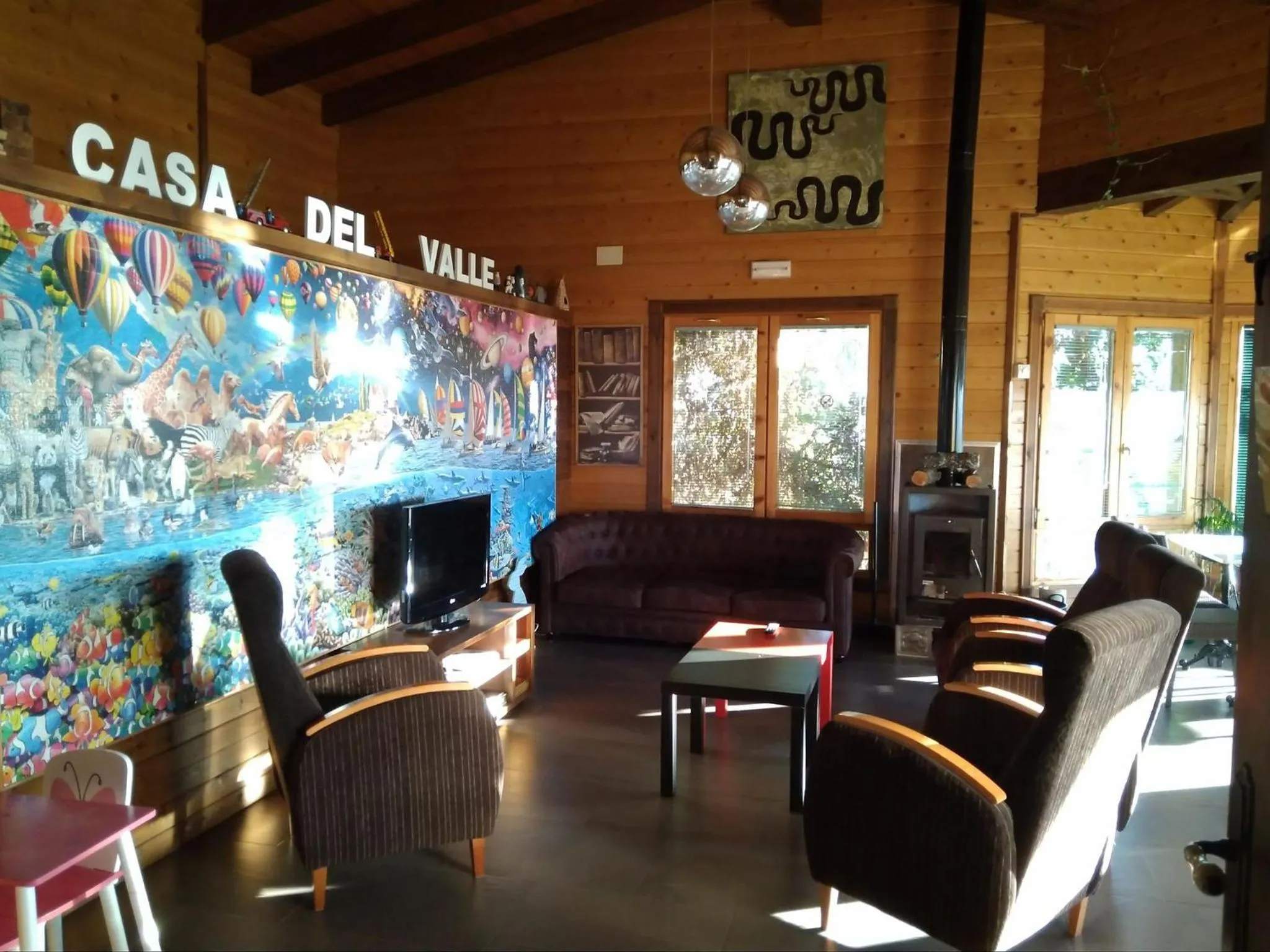 Communal lounge/ TV room in Casa del Valle, Lodges