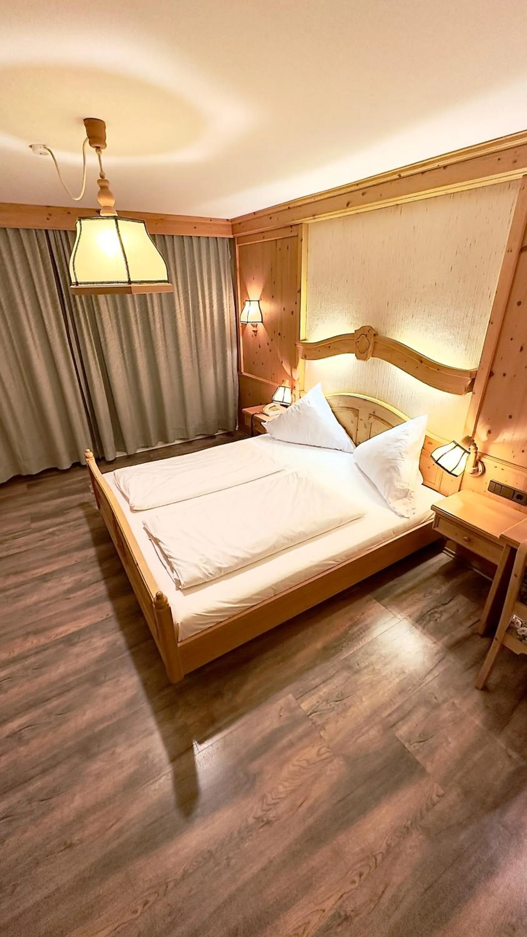 Bed in Hotel Alpenrose