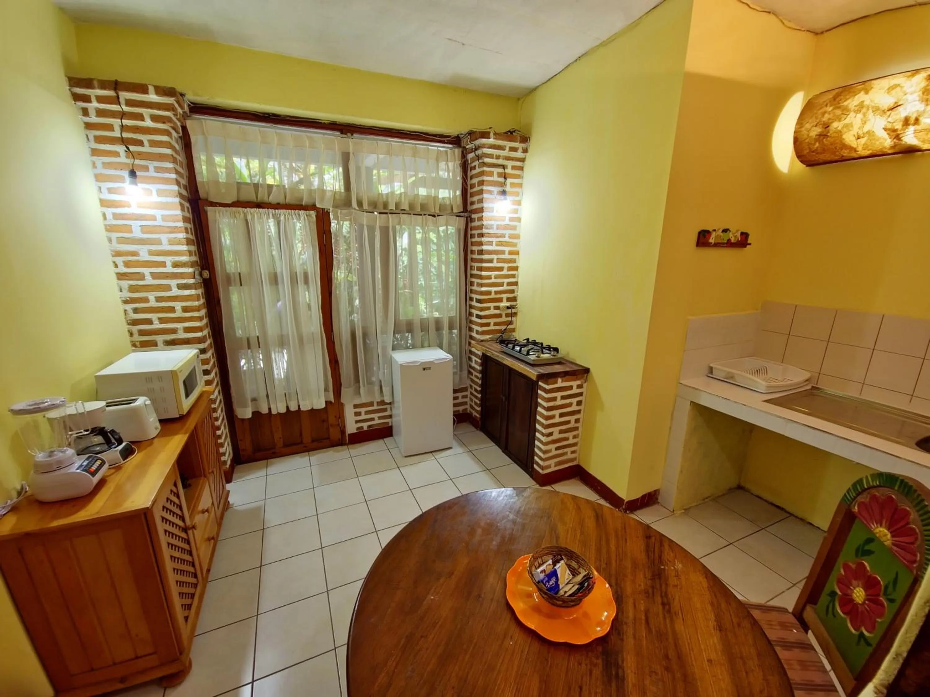 Kitchen or kitchenette in Eco Suites Uxlabil Guatemala