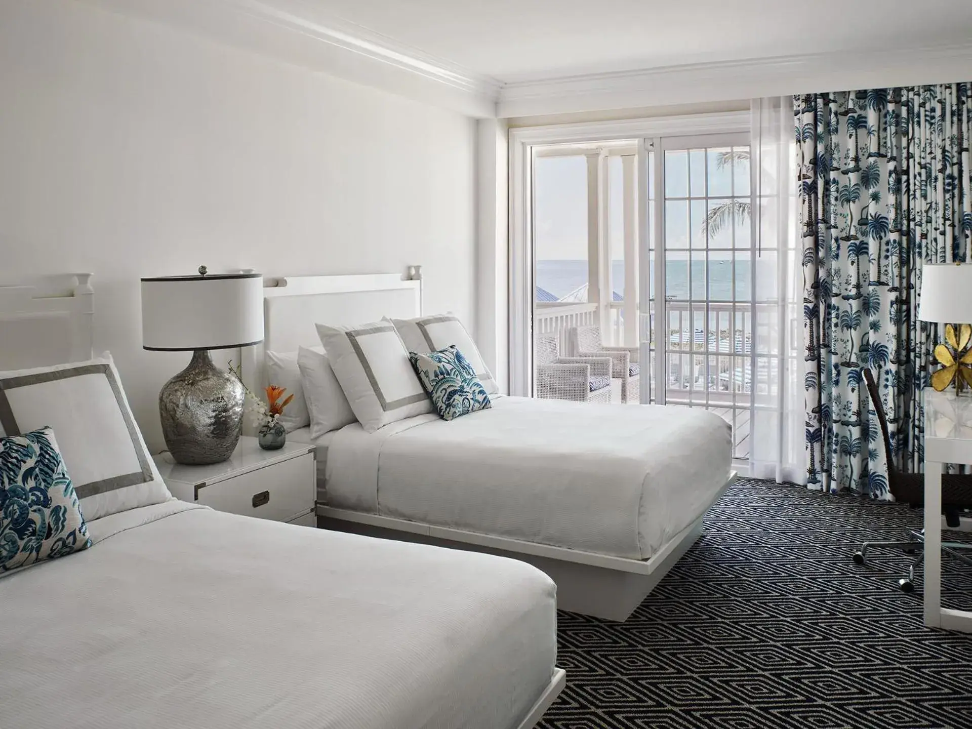 Oceanfront Balcony Two Bedroom Guestroom, Two Queens Primary/One King Room in Isla Bella Beach Resort & Spa - Florida Keys Oceanfront Balcony Two Bedroom Guestroom, Two Queens Primary/One King Room in Isla Bella Beach Resort & Spa - Florida Keys