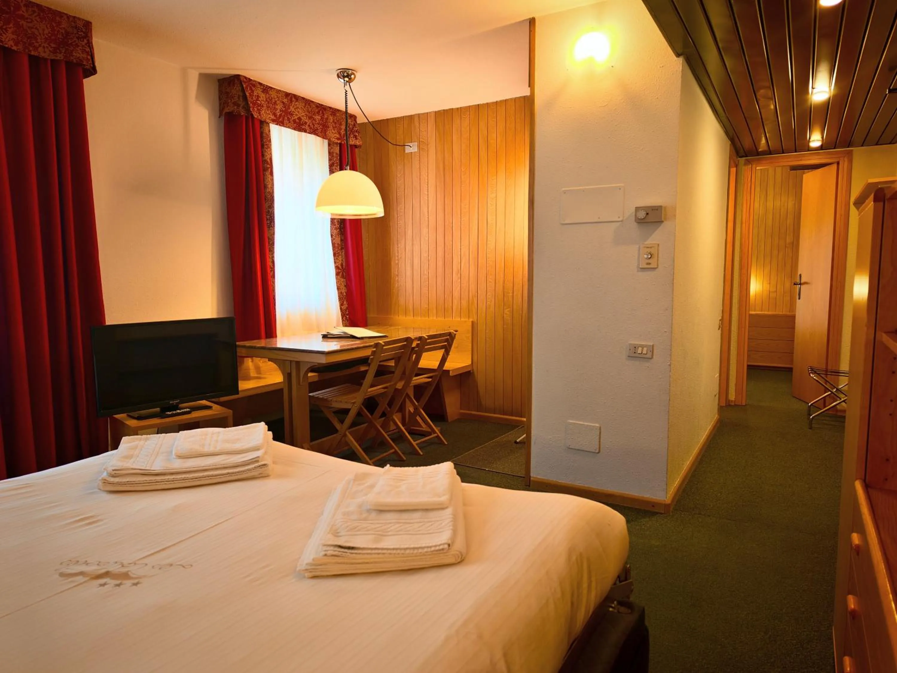 Living room, Bed in Residence Les Coupoles