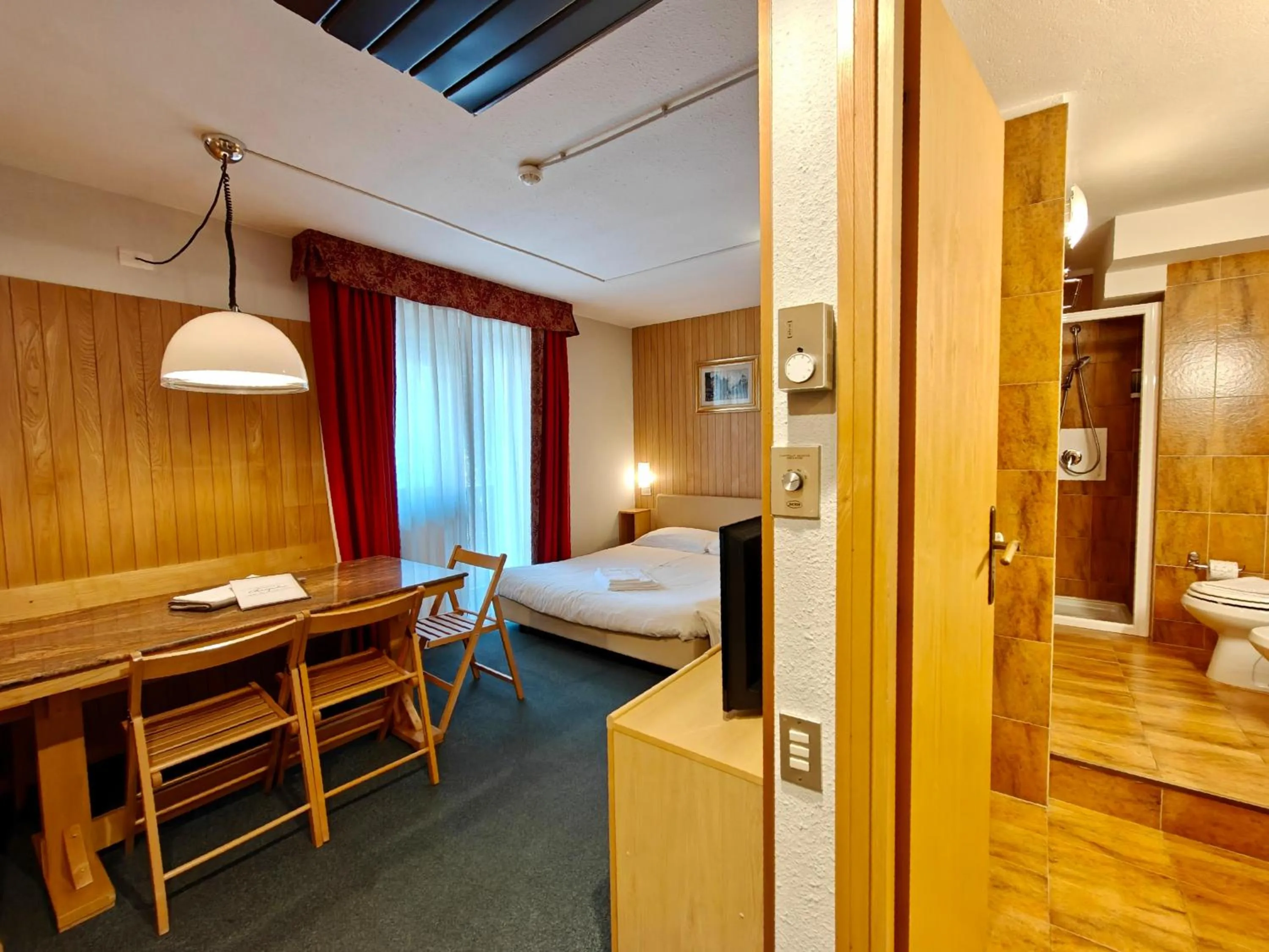 Living room, Bed in Residence Les Coupoles