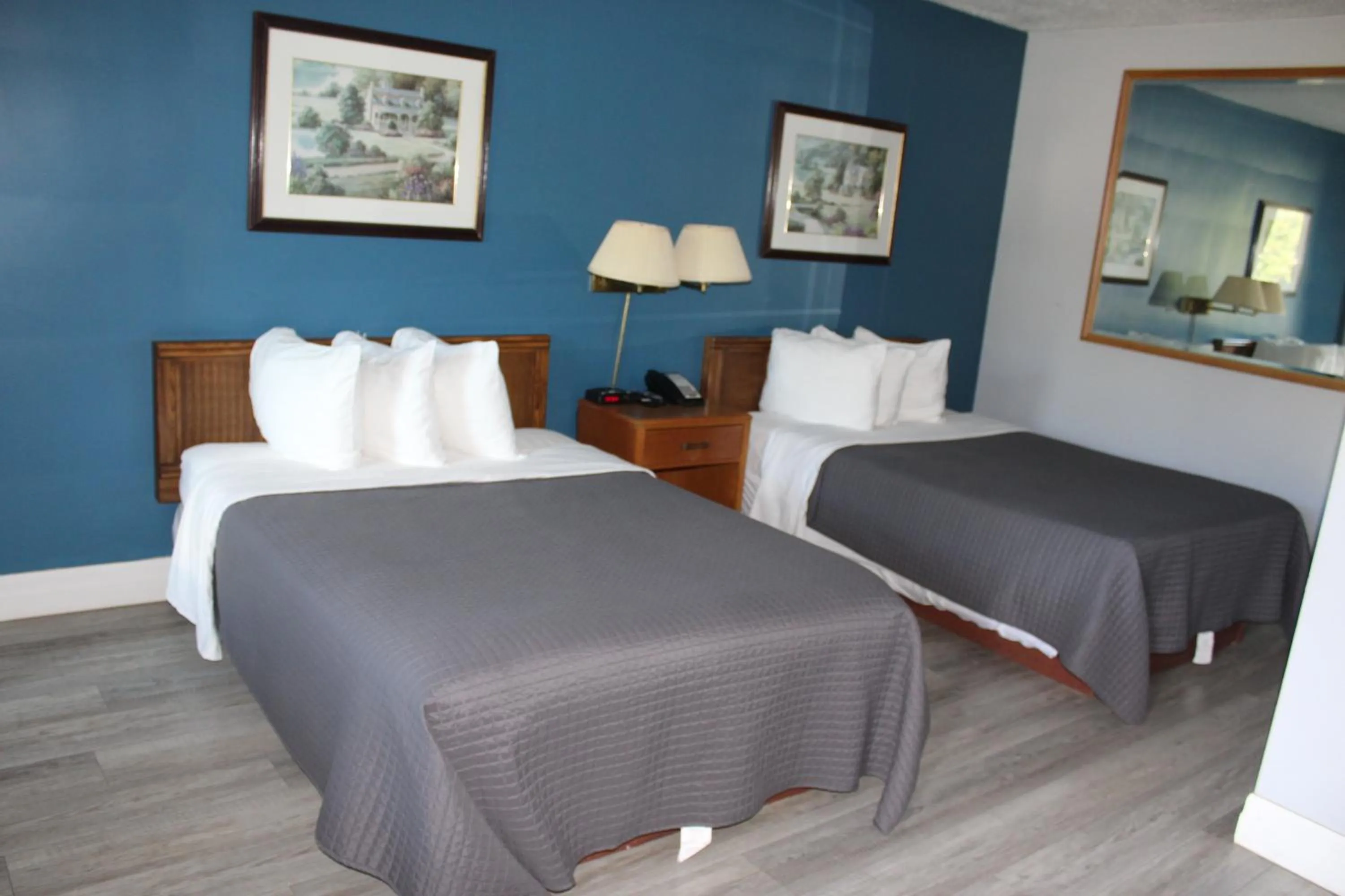 Bed in Bancroft Inn & Suites