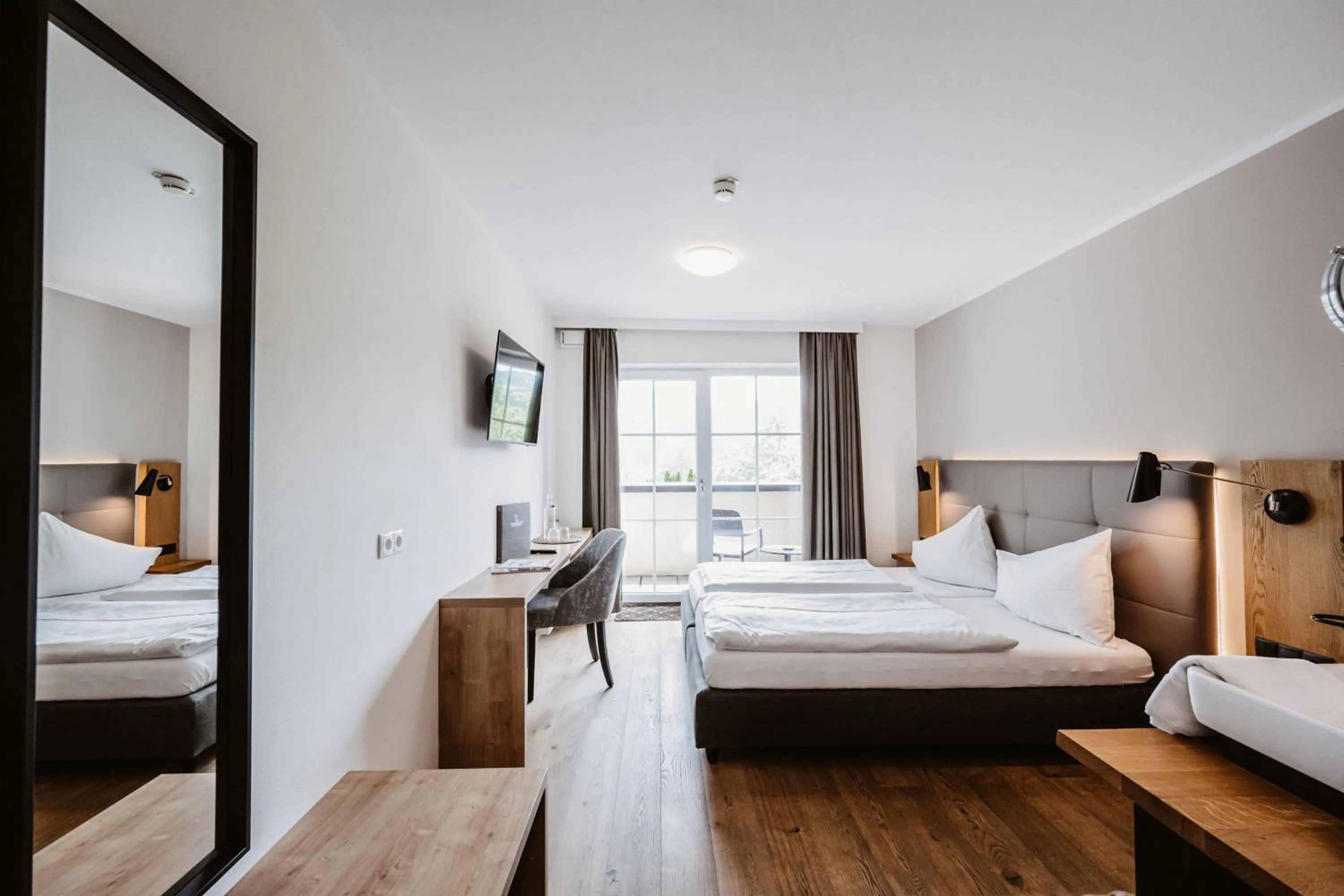 Photo of the whole room, Bed in Landhotel Laudersbach