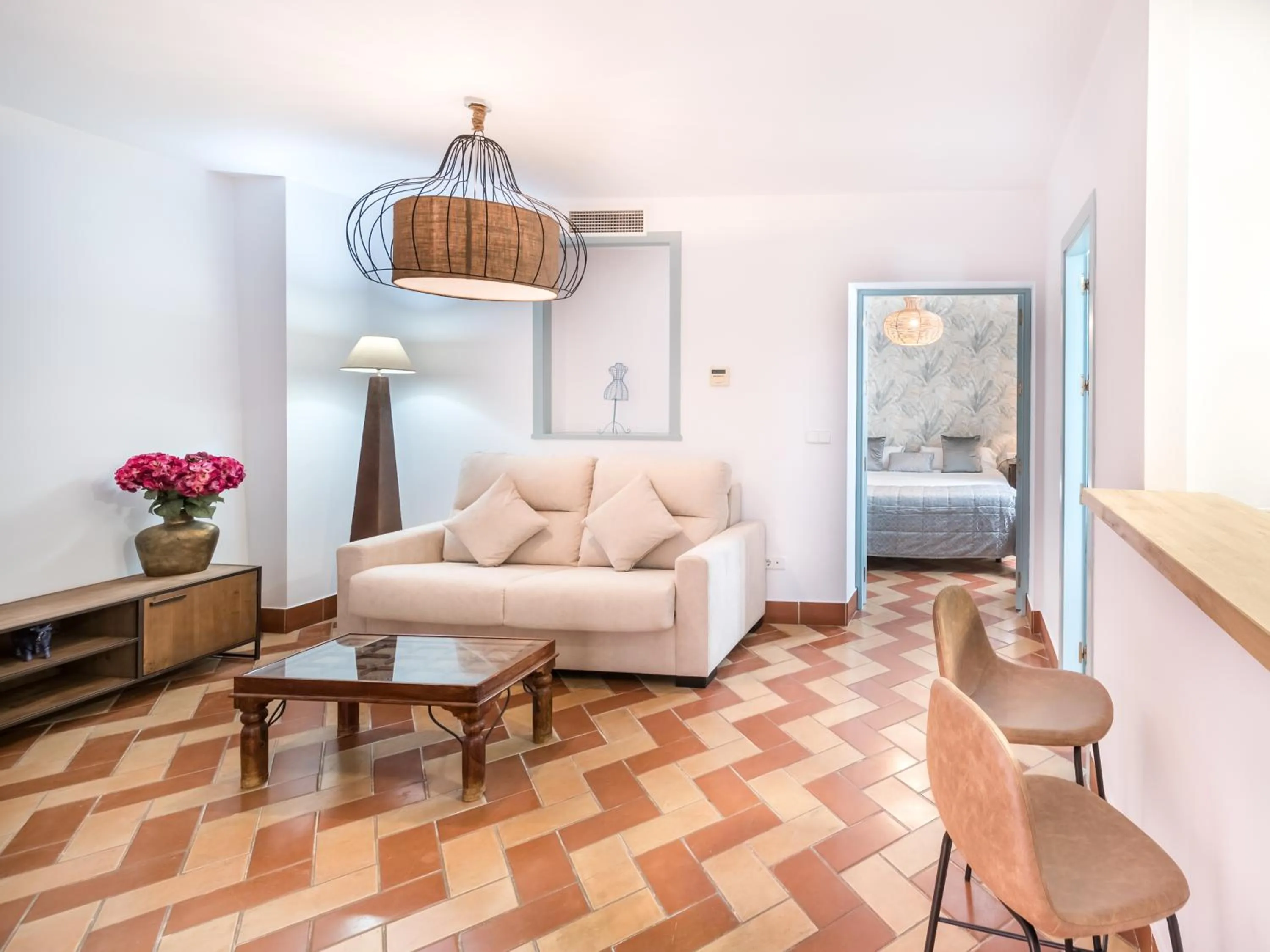 Living room, Bed in Apartamentos Boutique Vida