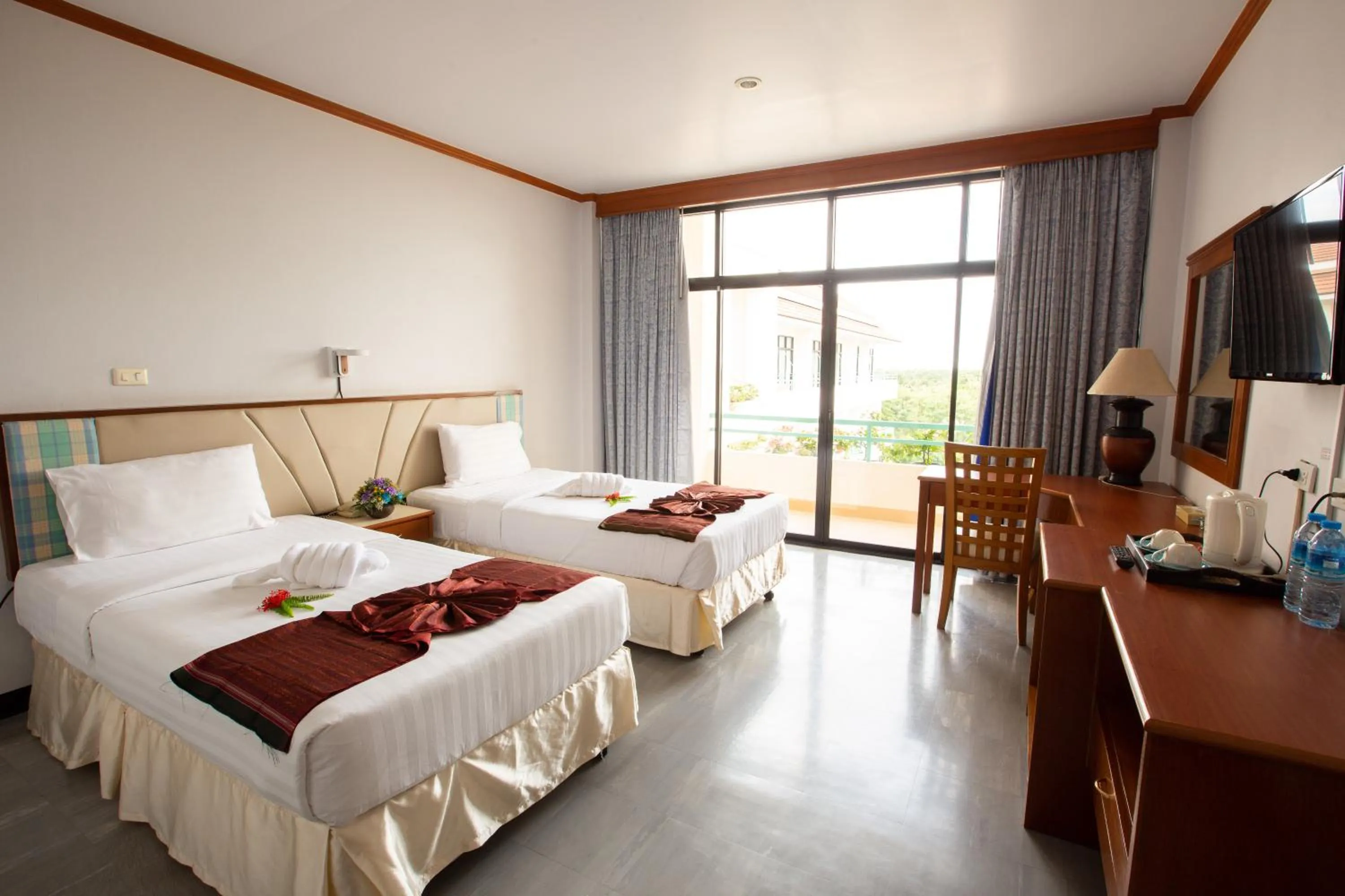 Bed in Surin Majestic Hotel