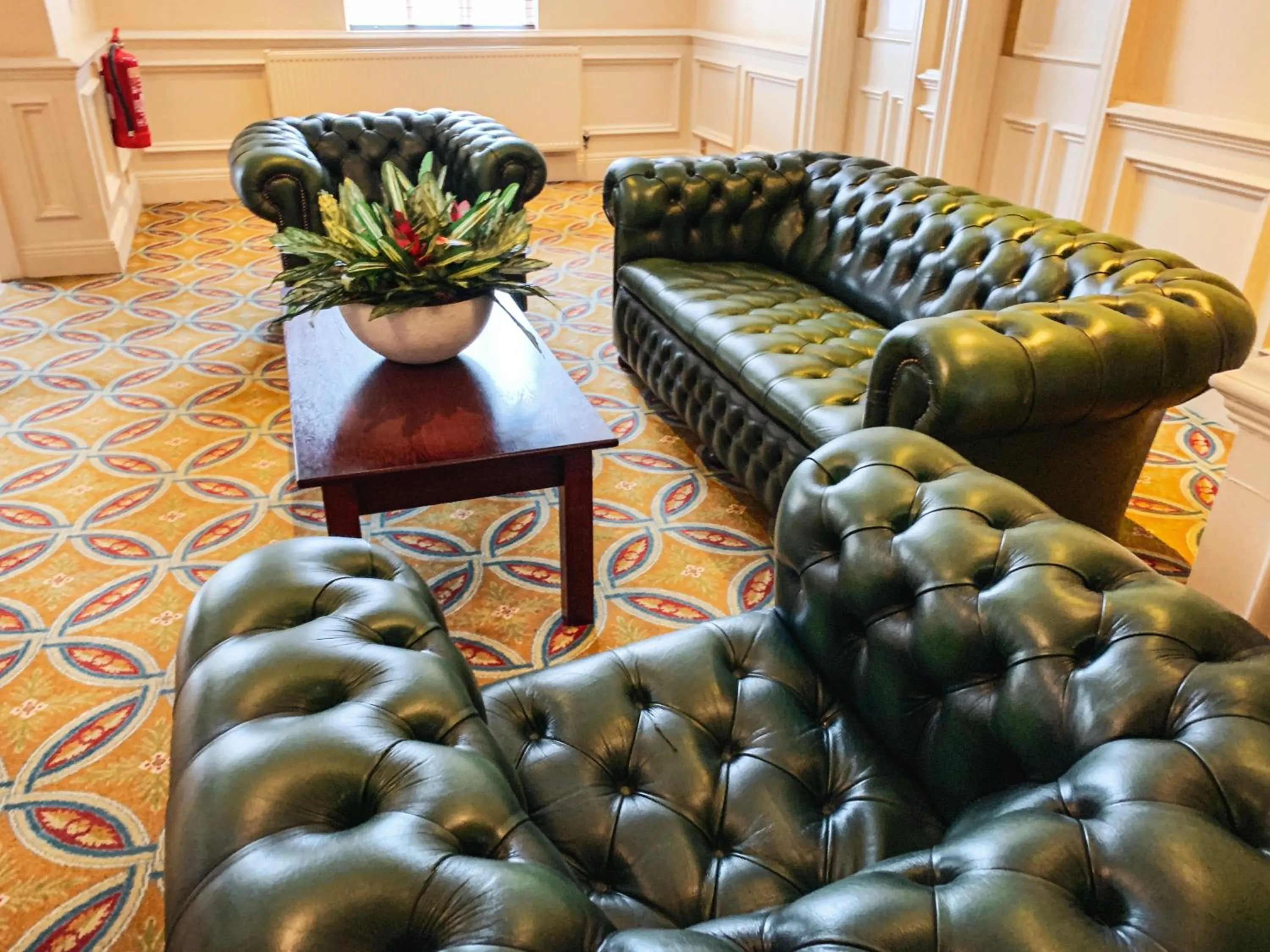 Communal lounge/ TV room in Hollins Hall Hotel, Spa & Golf
