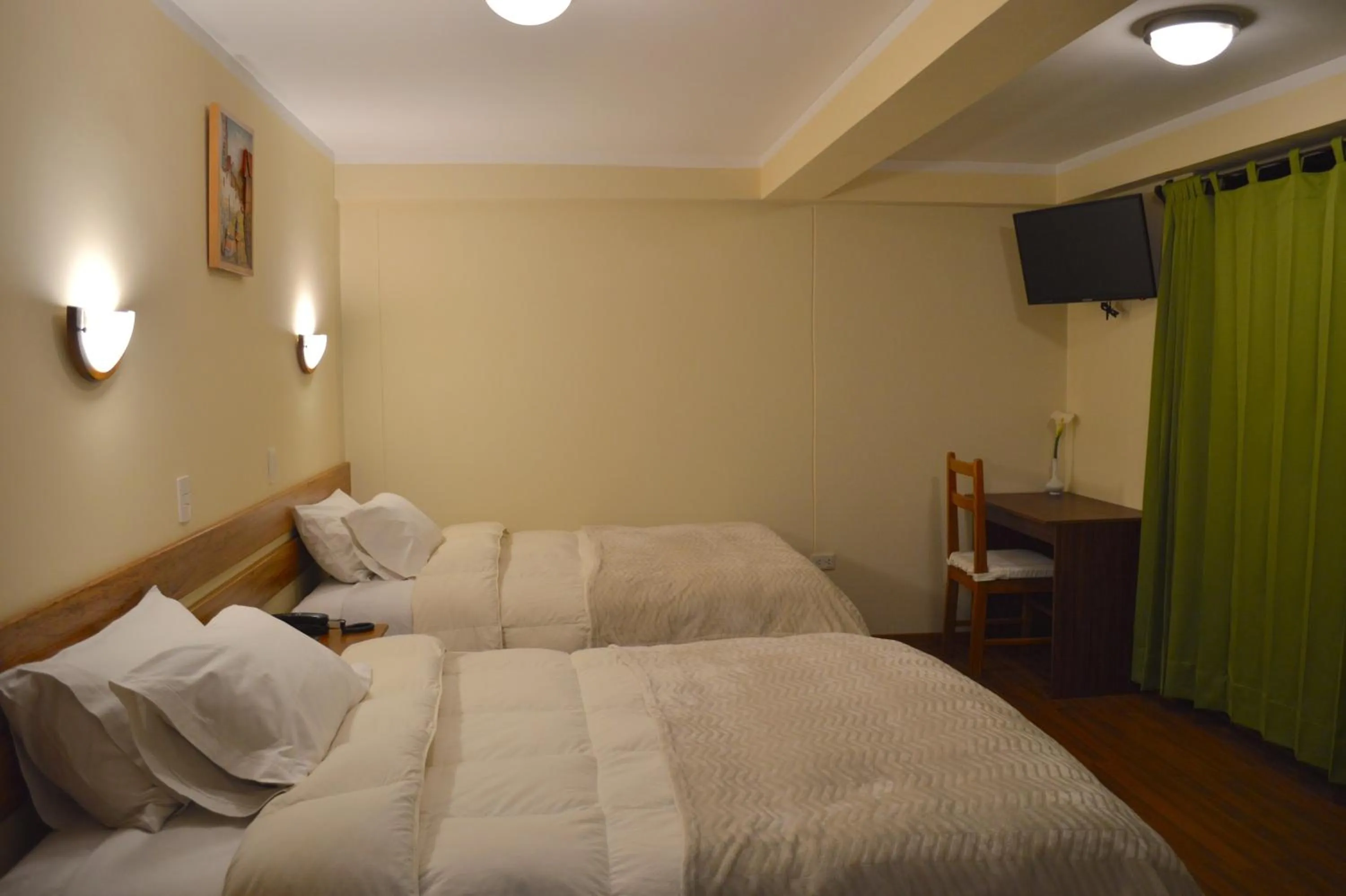 Bed in Florida del Inca Hotel