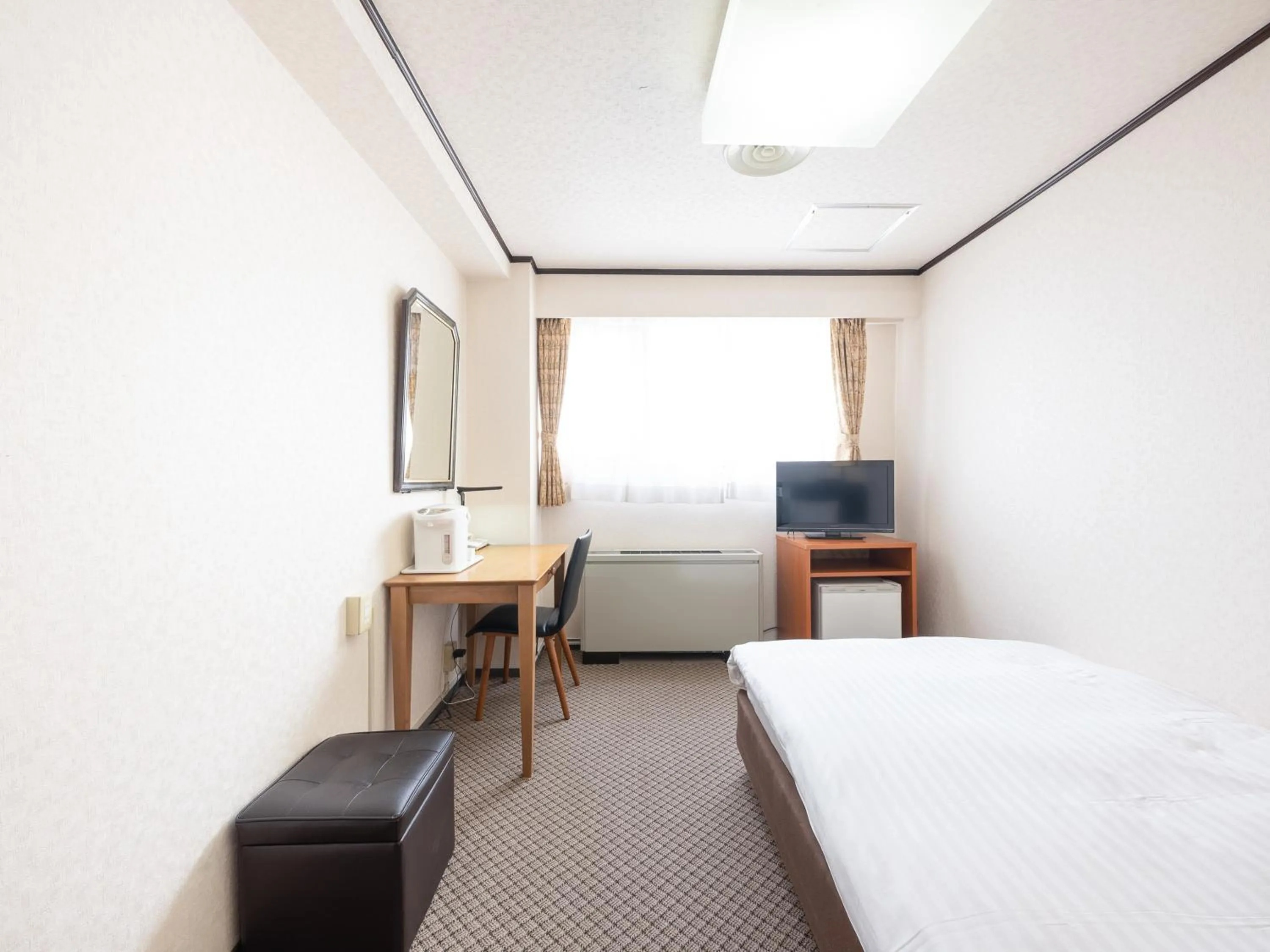 Photo of the whole room, Bed in Tabist Hotel New Washington Shibuya
