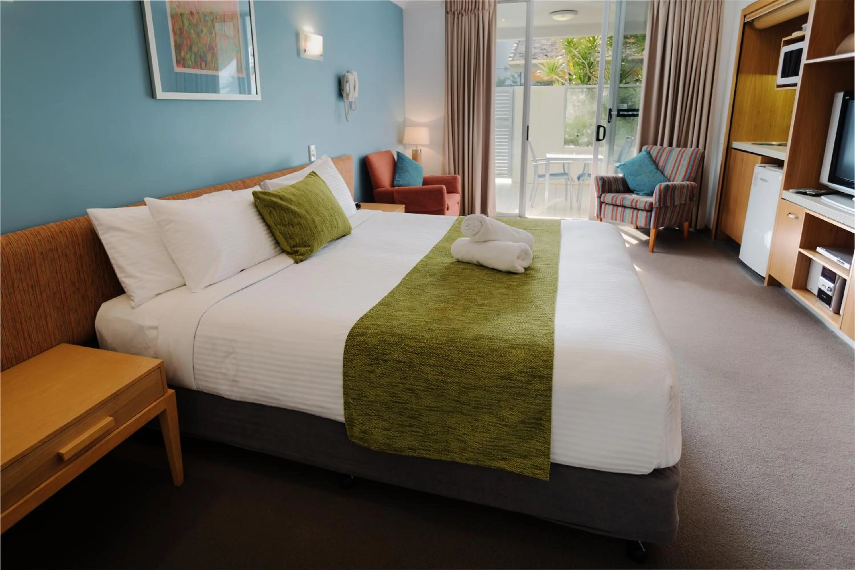 Bed in Coolum Seaside Apartments