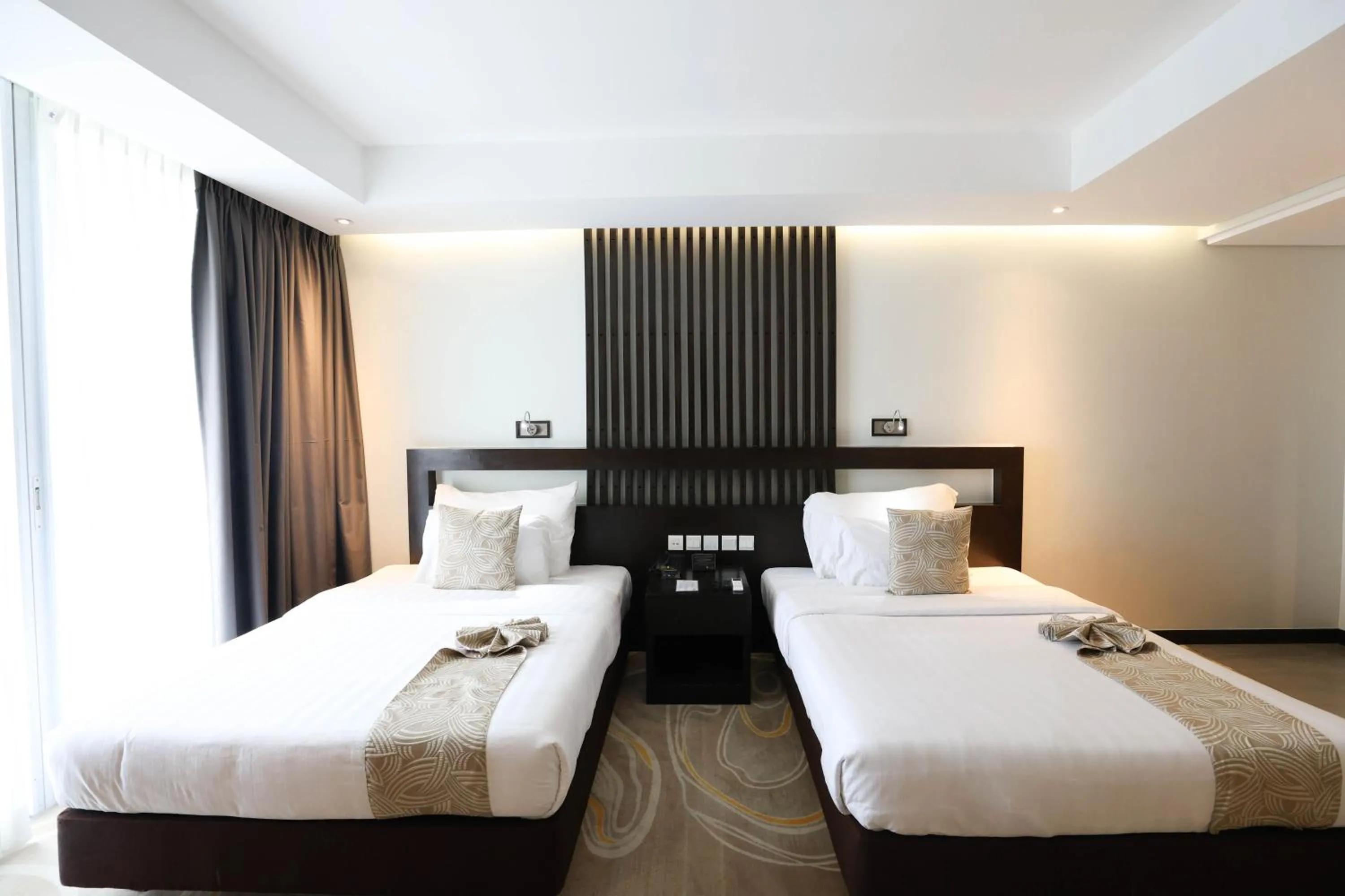 Bed in The Oriental Hotel Legazpi