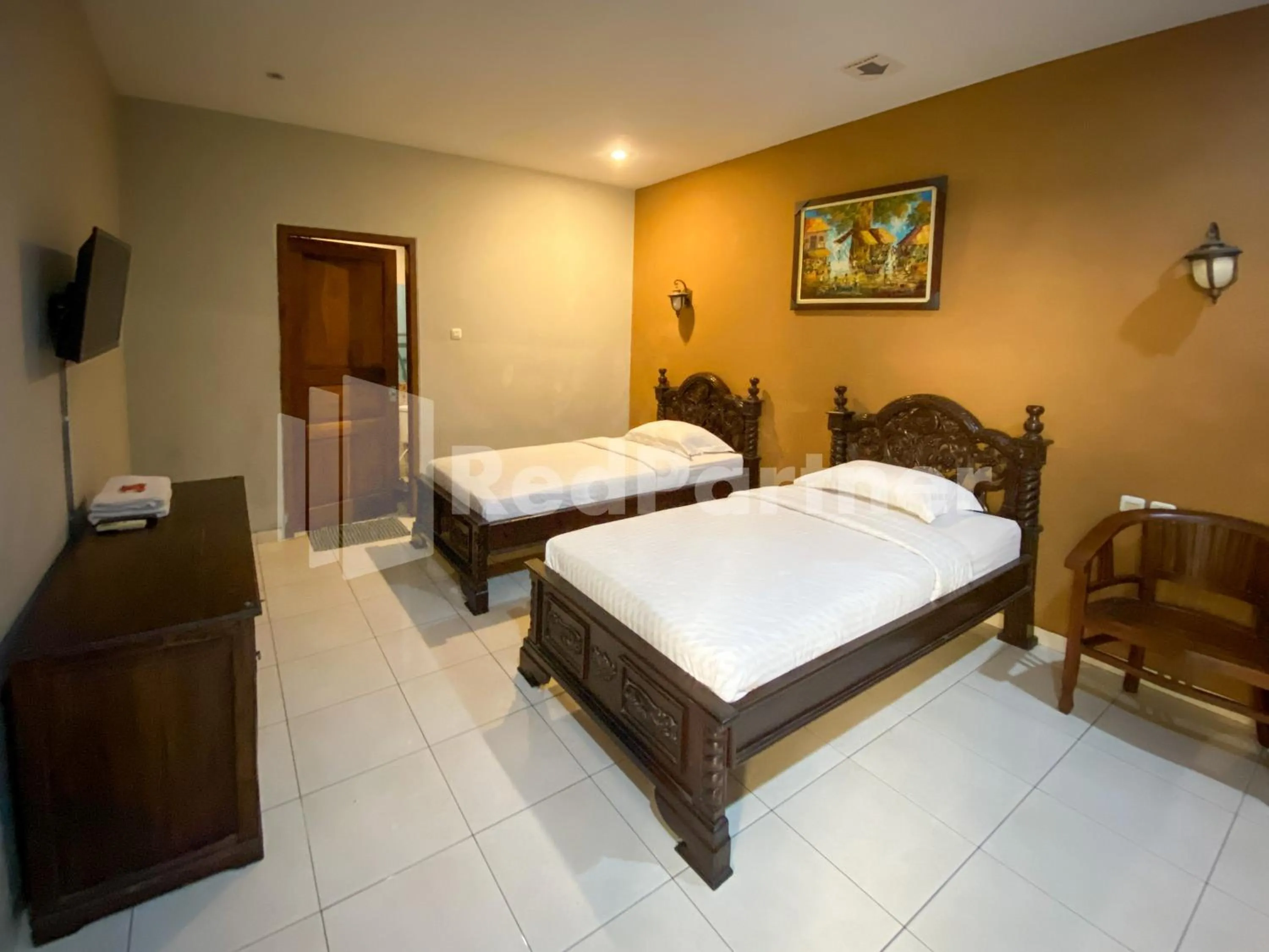 Bed in Istana Griya 2 Hotel Solo RedPartner